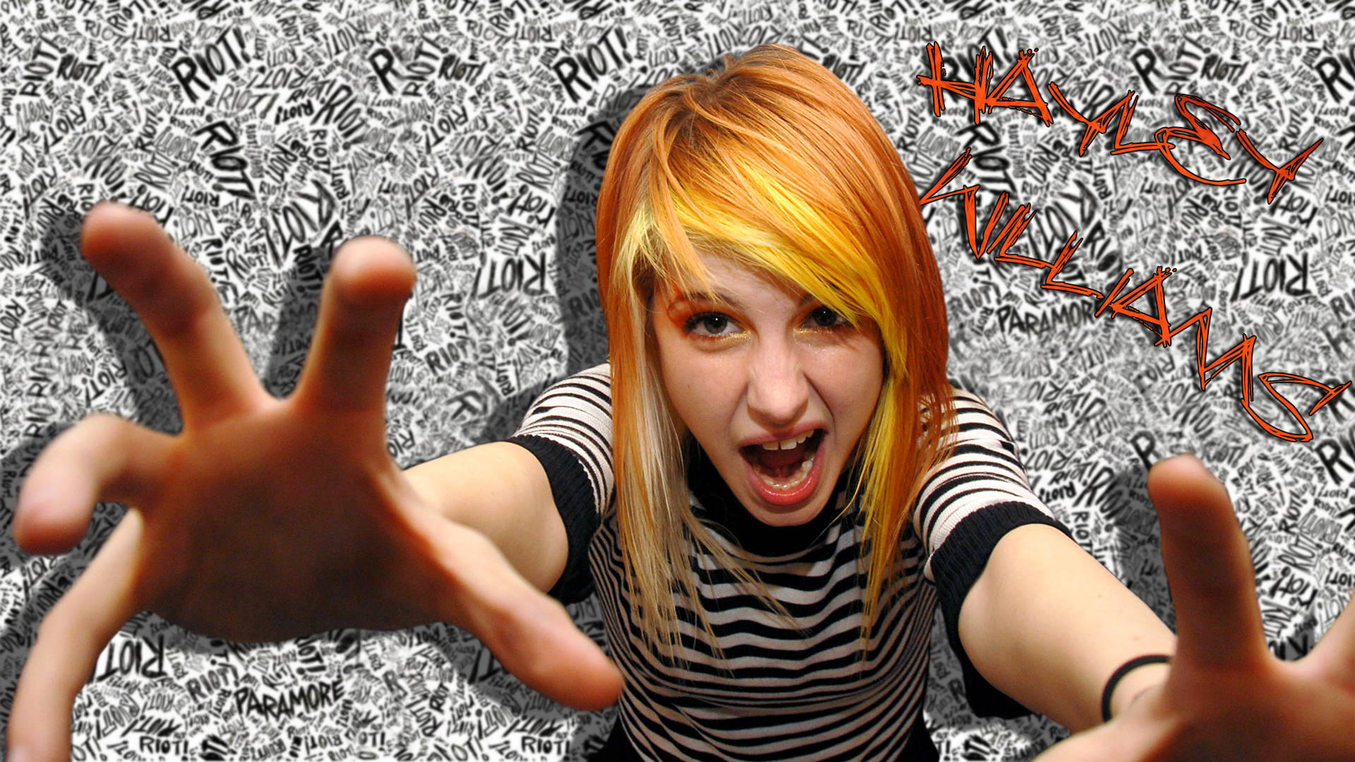 Hayley Williams 桌布 壁紙 — 一個橙色頭髮、穿著條紋襯衫的人，在塗鴉牆前向鏡頭伸手尖叫。