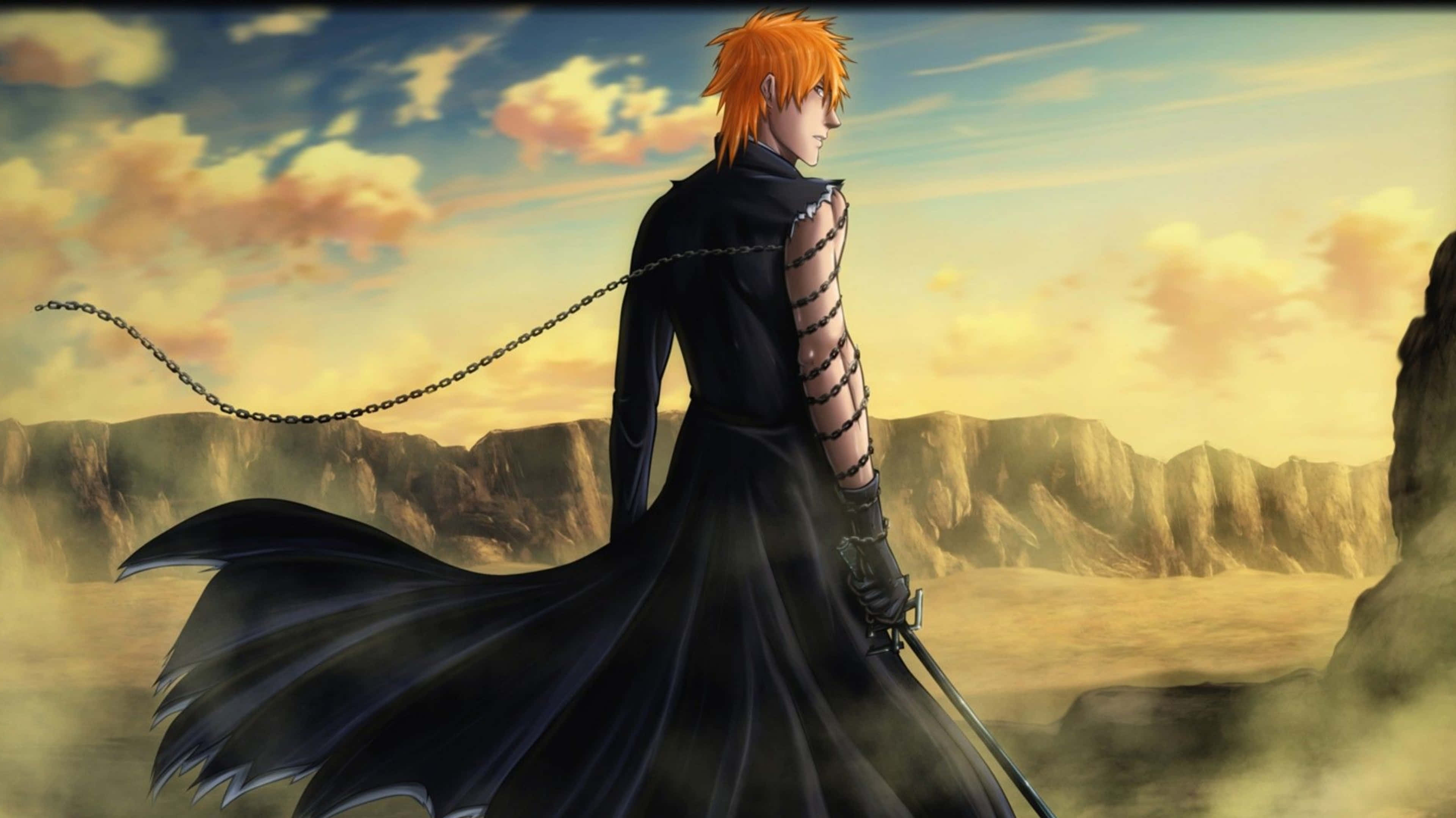 Ichigo 4K 桌布 壁紙 — 一個橙色頭髮、身穿黑色外套的動漫角色，在陰天下的沙漠峽谷中手持劍站立。