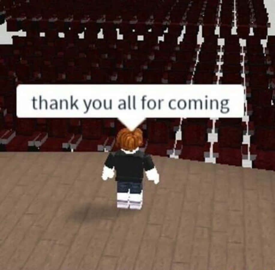 Roblox Boy 桌布 壁紙 — 一個橙色頭髮的Roblox角色站在木製舞台上，面向空無一人的紅色劇院座位，對話框說謝謝大家來參加。