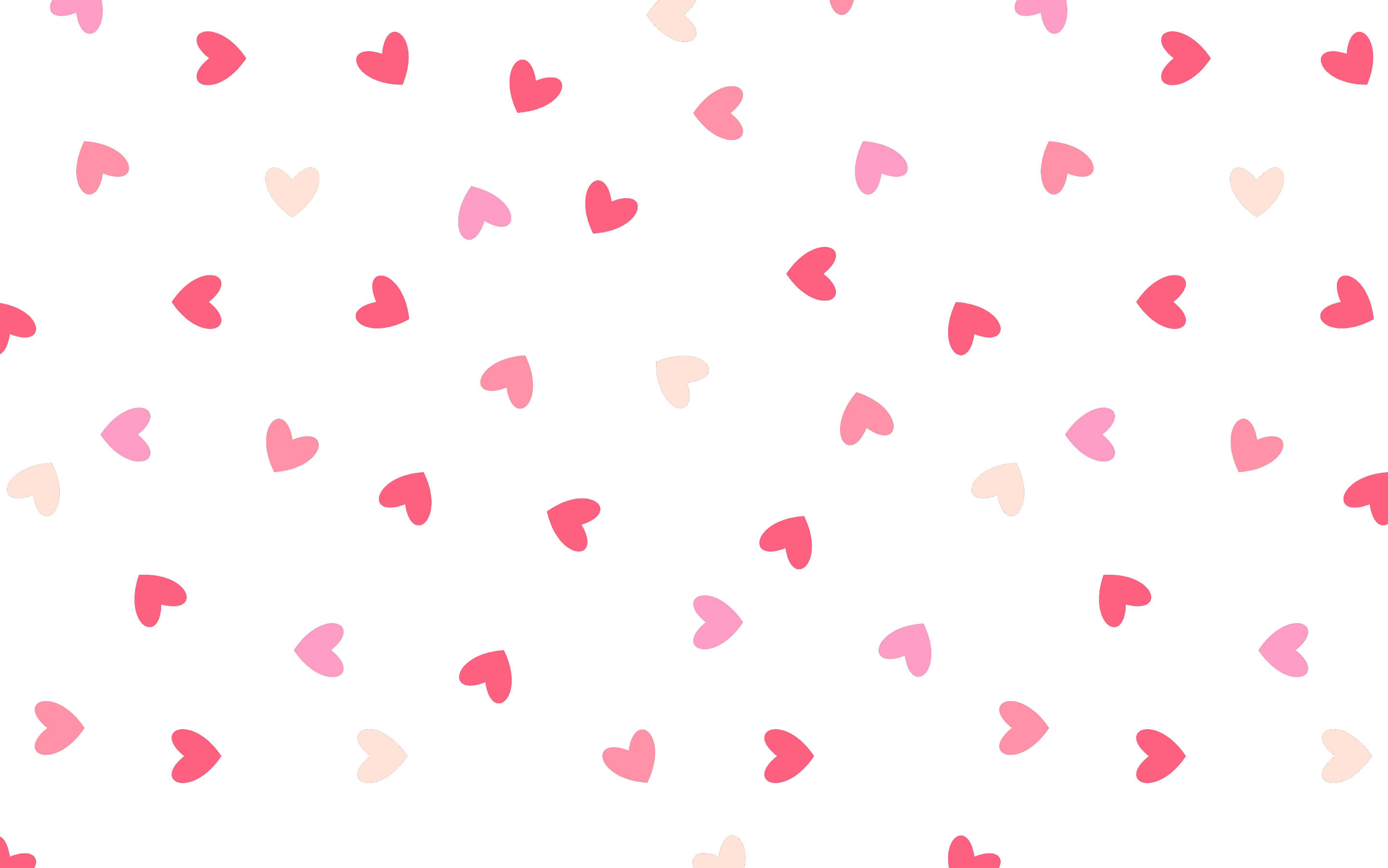 Tumblr Valentines Day 桌布 壁紙 — 一個歡快的圖案，散落的粉紅色和淺粉紅色心形漂浮在潔白的背景上。