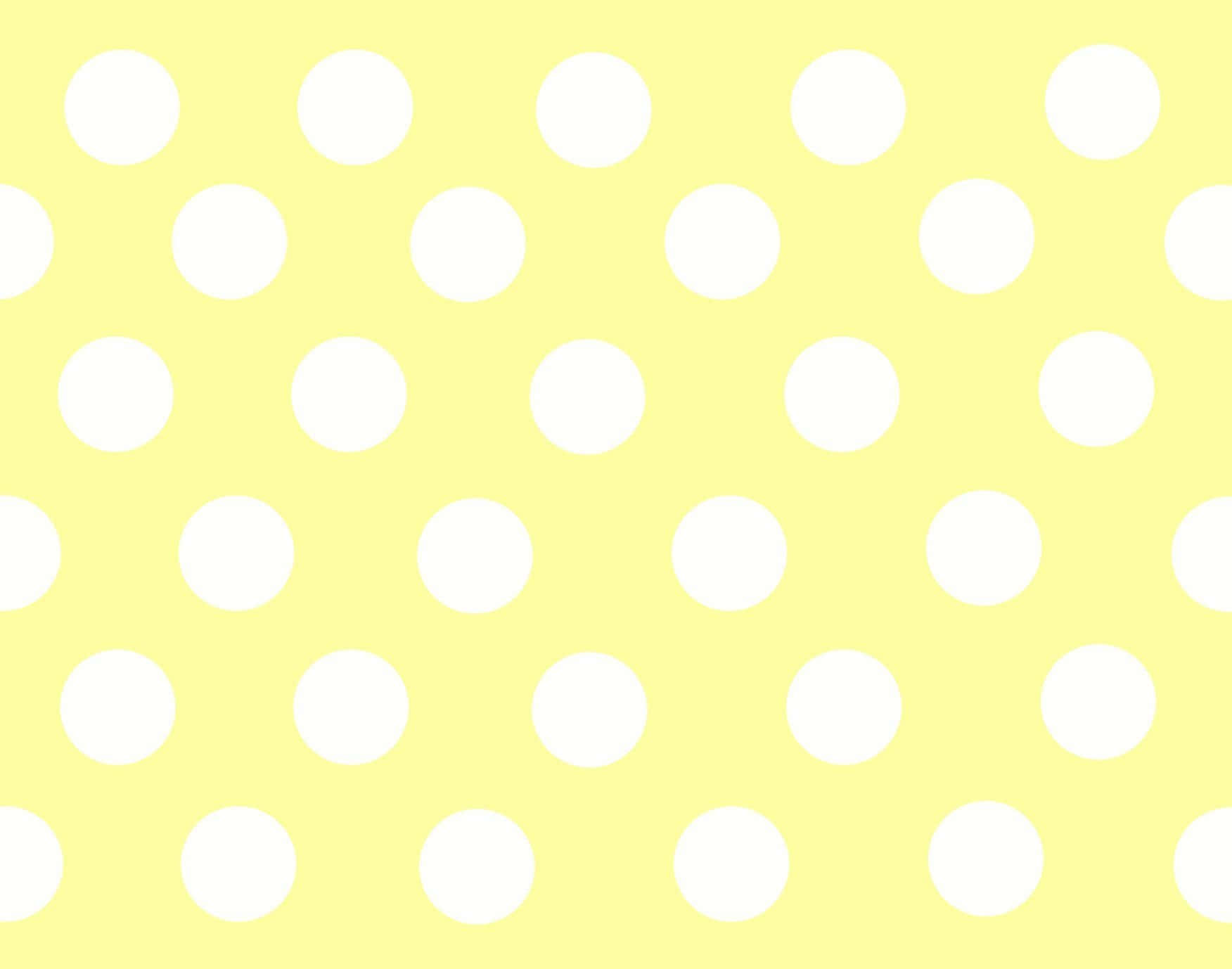 Yellow Polka Dot 桌布 壁紙 — 一個歡快的黃色背景，點綴著均勻分佈的白色圓點，營造出俏皮而簡約的圖案。