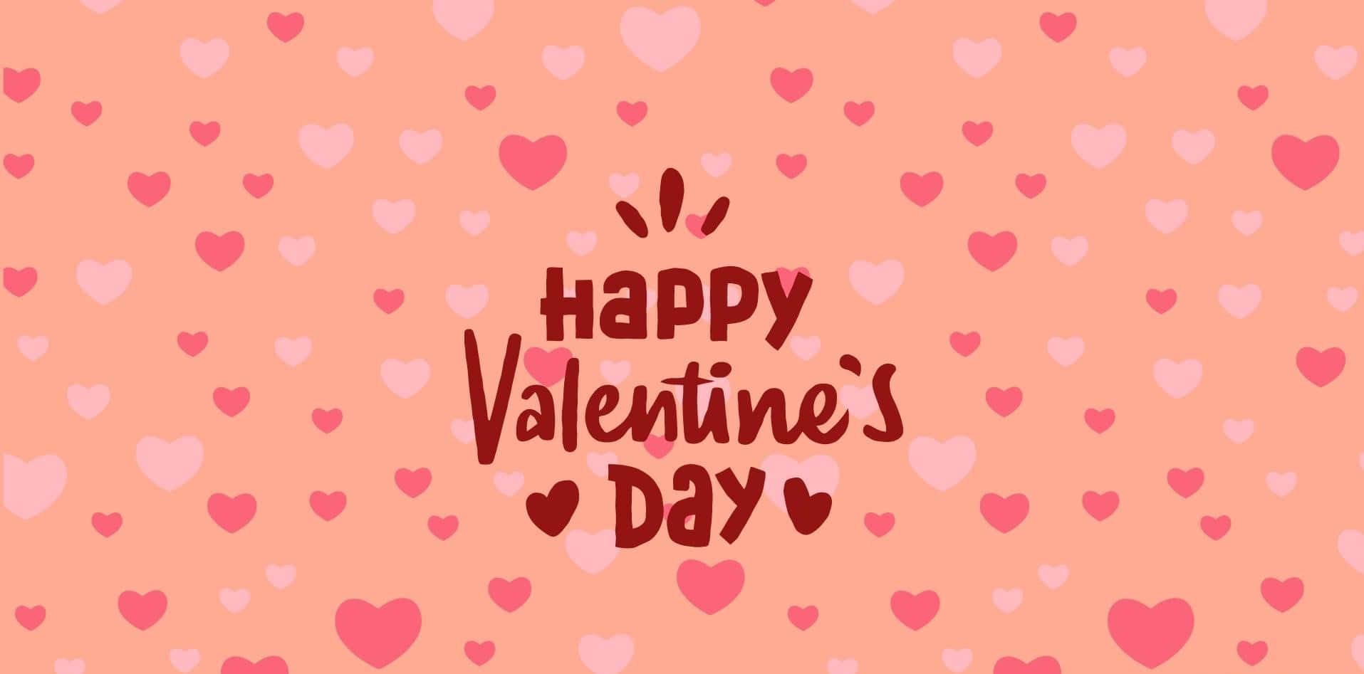 High Resolution Valentines Day 桌布 壁紙 — 一個歡樂的情人節問候，以粗體紅色文字為中心，周圍散落著粉紅色心形，背景是柔和的珊瑚色。