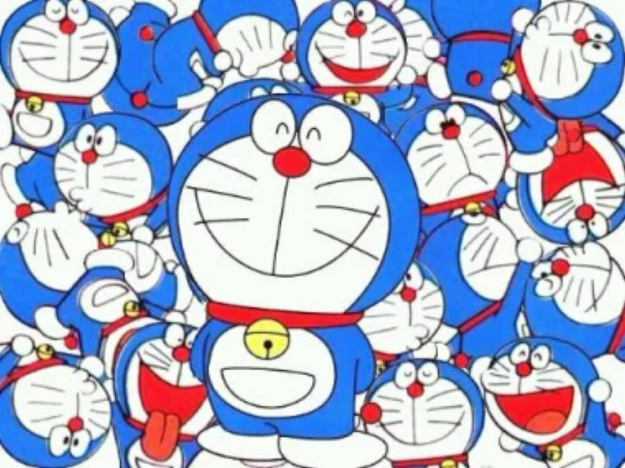 doraemon 4K 桌布 壁紙 — 一個歡樂的桌布，帶有密集圖案的微笑藍色機器貓角色，配有紅色項圈和黃色鈴鐺。