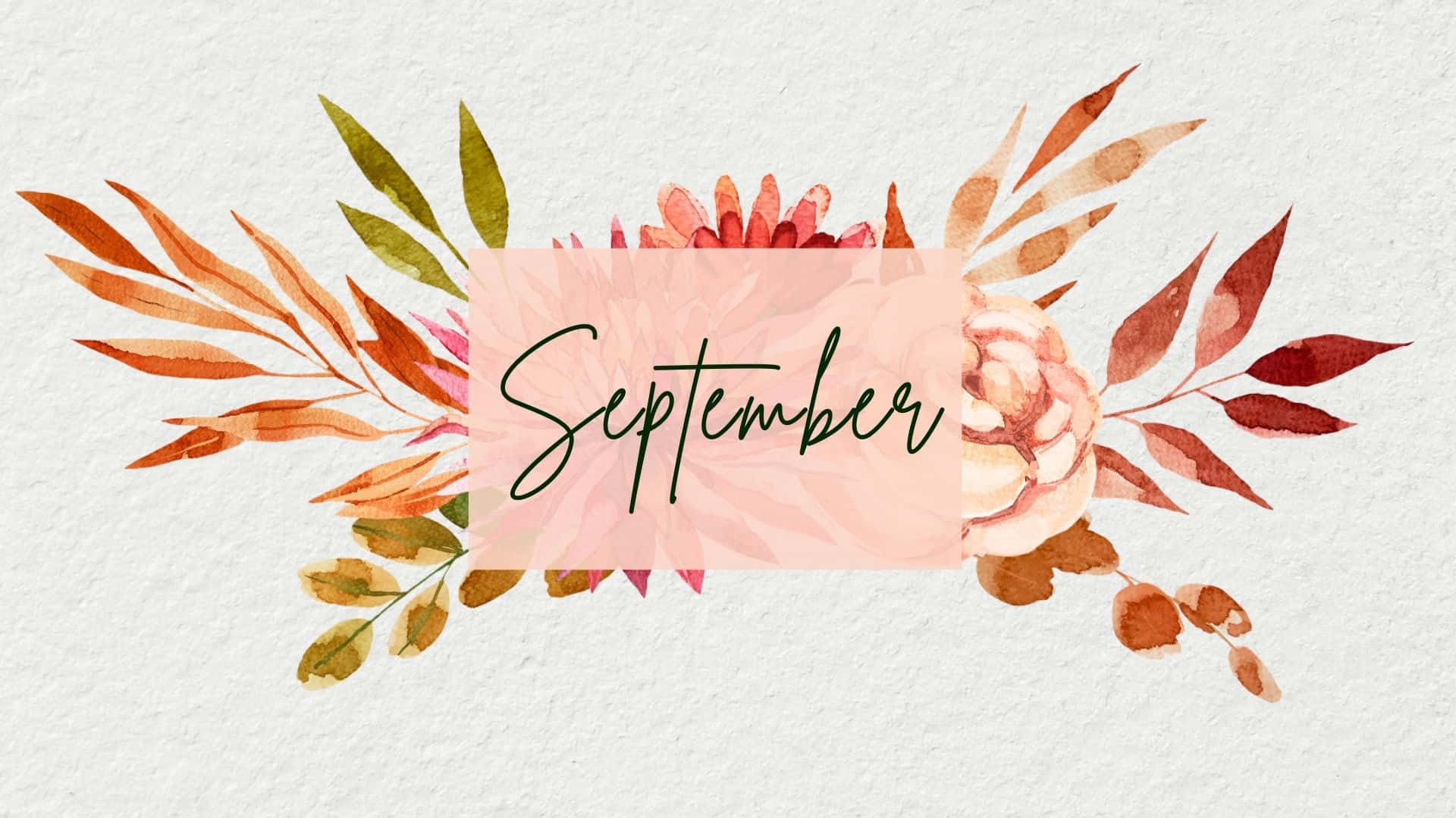September 桌布 壁紙 — 一個水彩花卉花環以秋日色調框住「September」這個詞，位於有紋理的紙上。