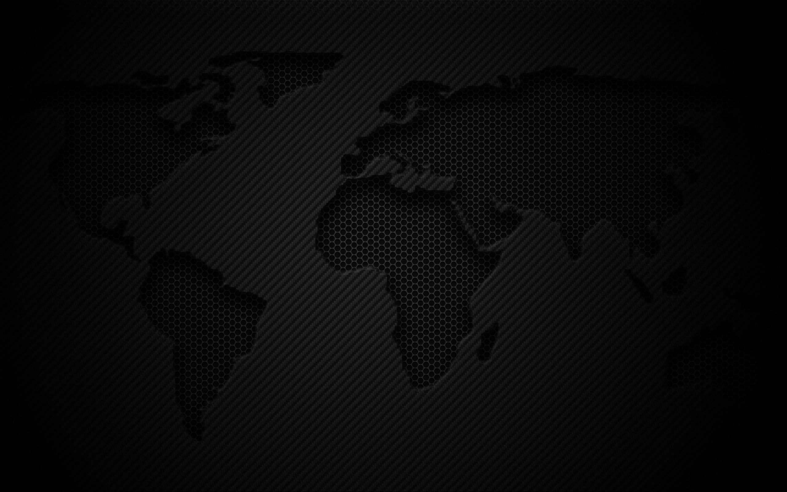 macOS 桌布 壁紙 — 一個深色世界地圖剪影，帶有六邊形紋理，覆蓋在單色碳纖維圖案上。