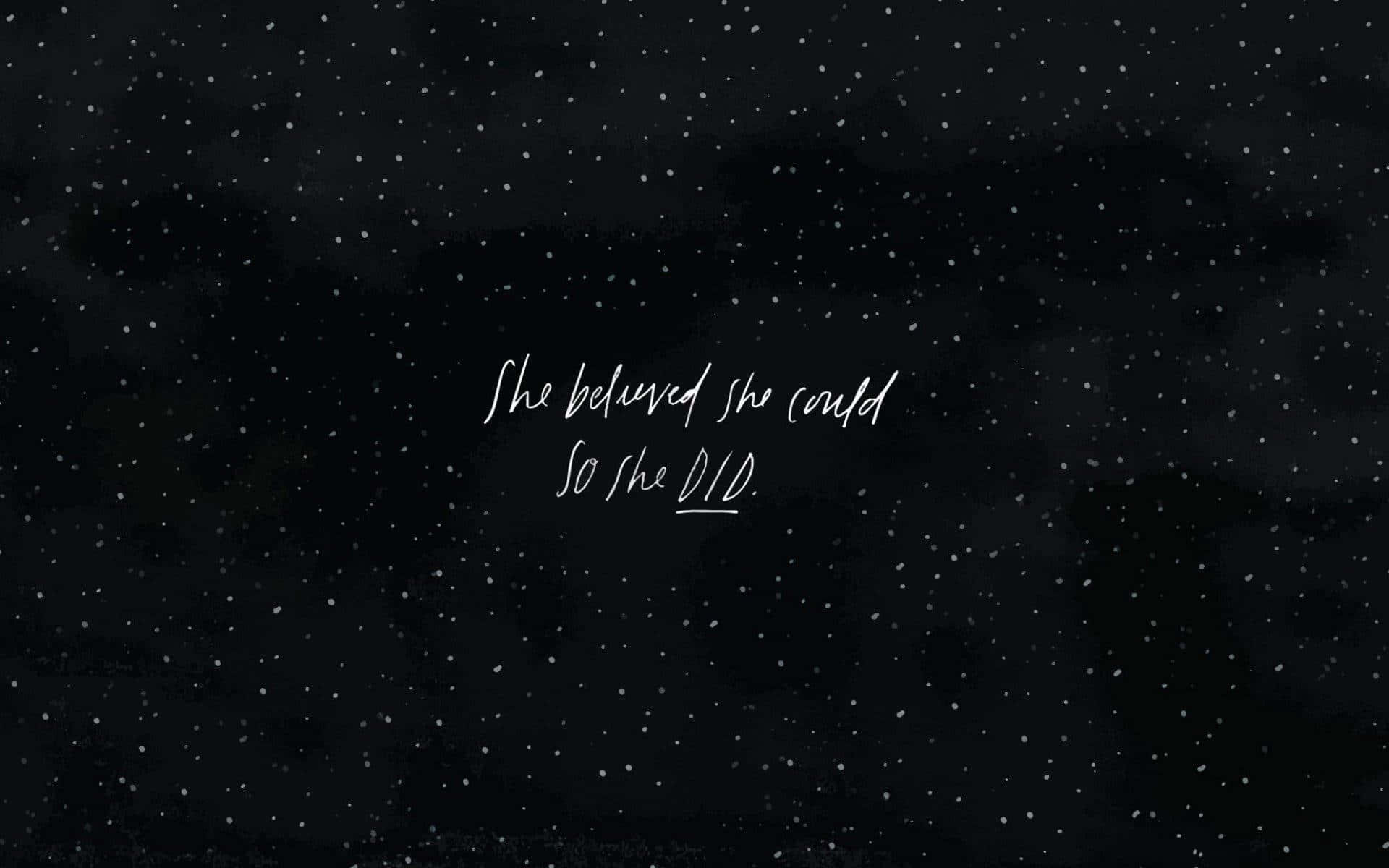 Motivational Quotes 桌布 壁紙 — 一個深色紋理背景，綴有白色點點，上面有手寫的白色草書句子「She believed she could so she did」。