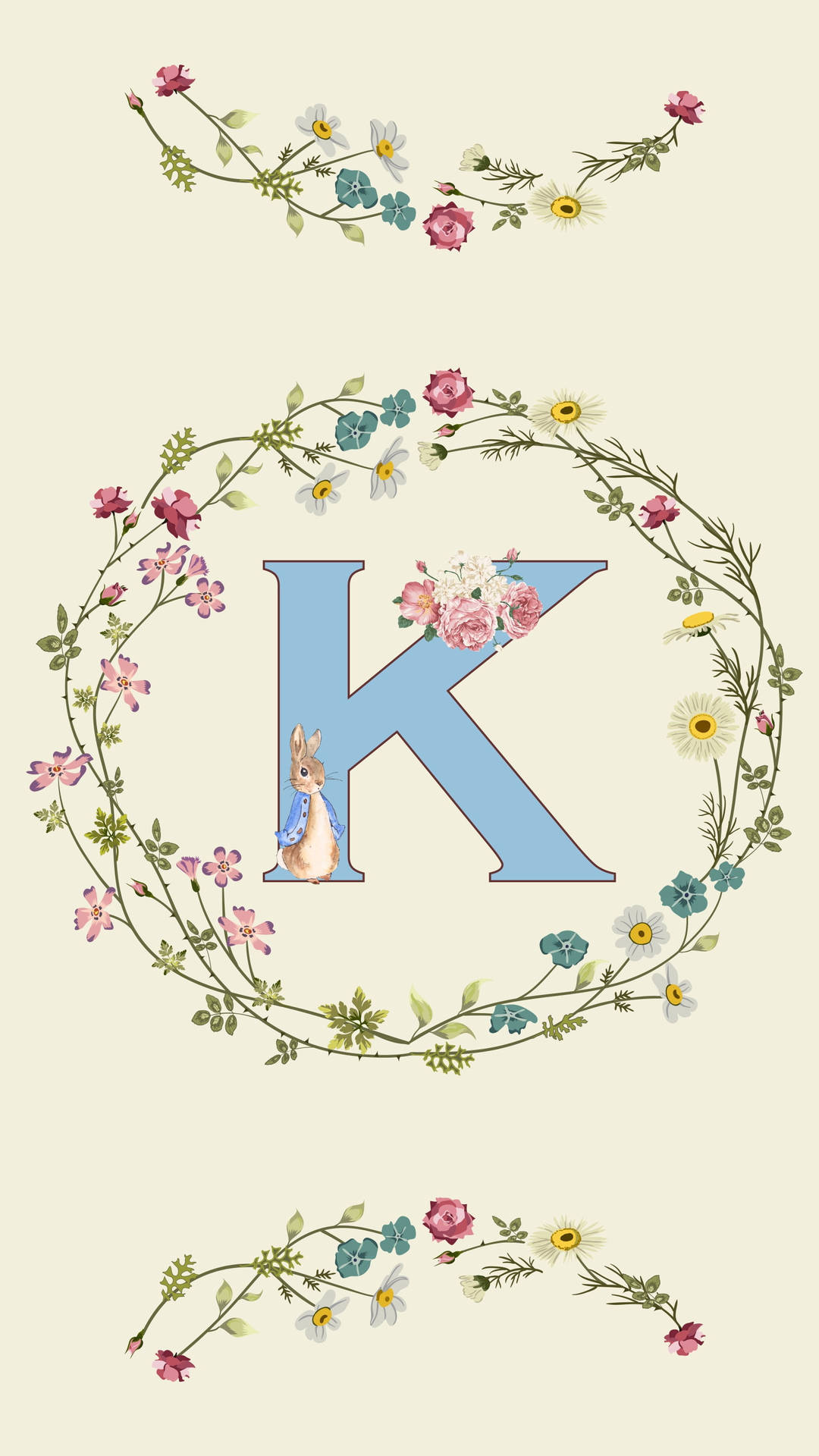 一個藍色字母K，被花環和一隻戴著藍色圍巾的兔子環繞。 — 字母K動圖 壁紙