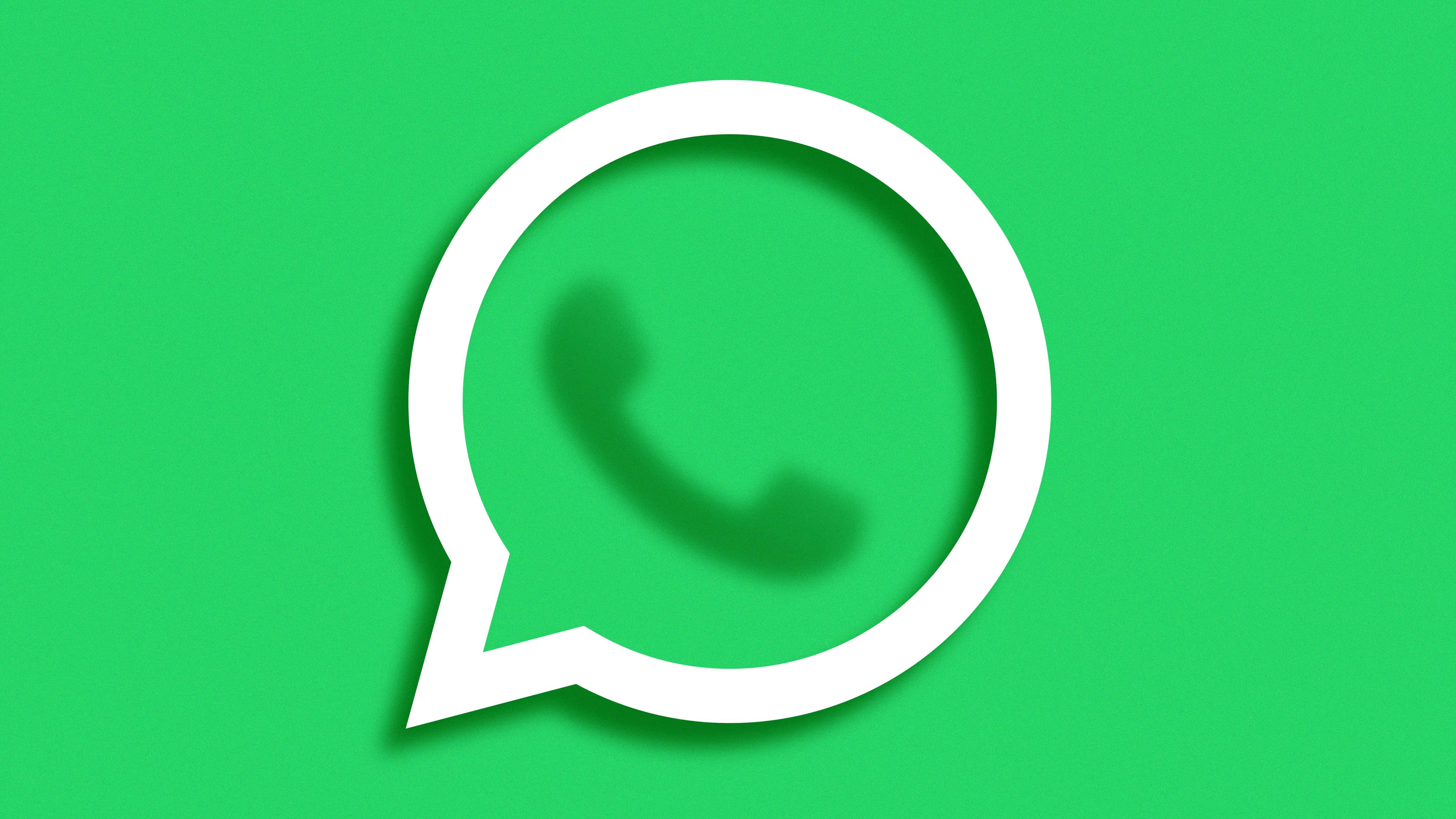 WhatsApp 桌布 壁紙 — 一個清晰的白色WhatsApp標誌帶有微妙的陰影，居中放置在純色鮮豔的綠色背景上。