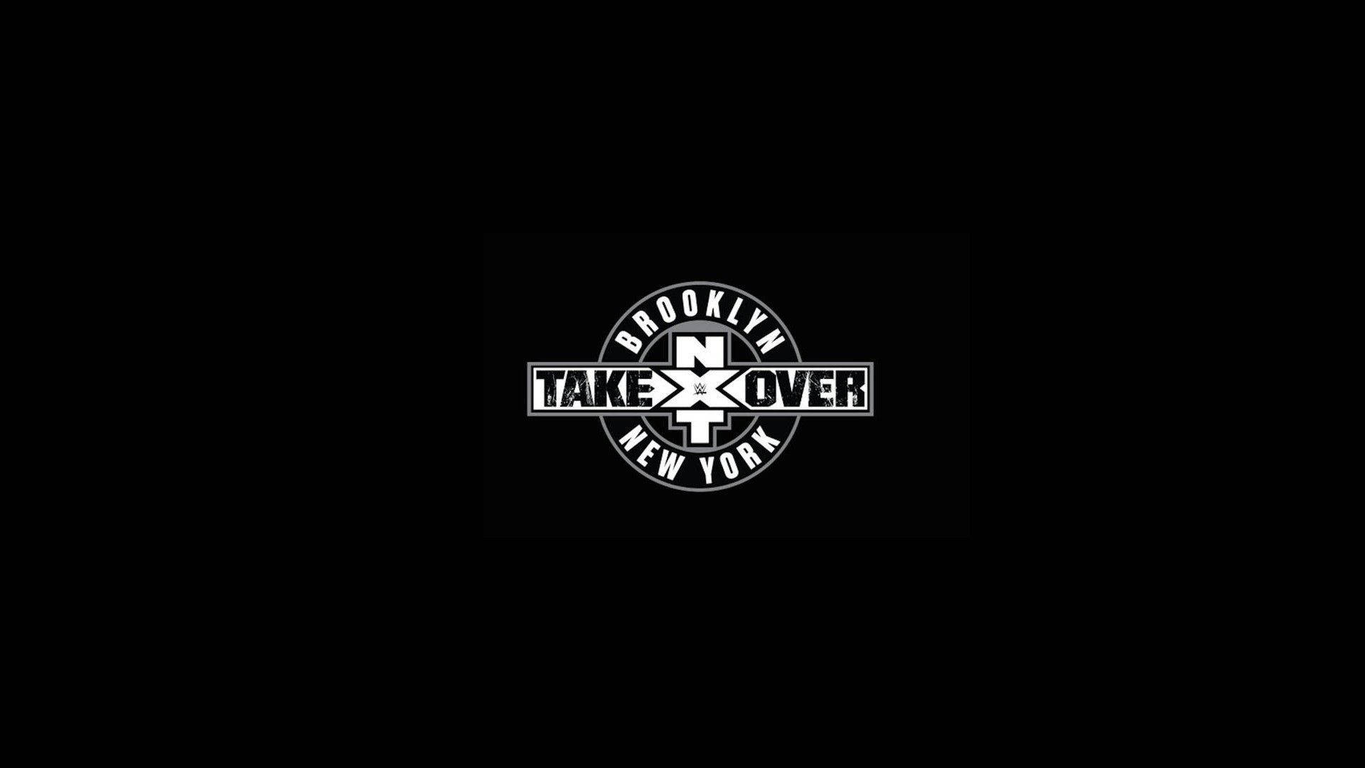 nxt 桌布 壁紙 — 一個清晰的白色圓形標誌，上面有「BROOKLYN TAKEOVER NEW YORK」文字和一個風格化的「N」，居中在純黑色背景上。