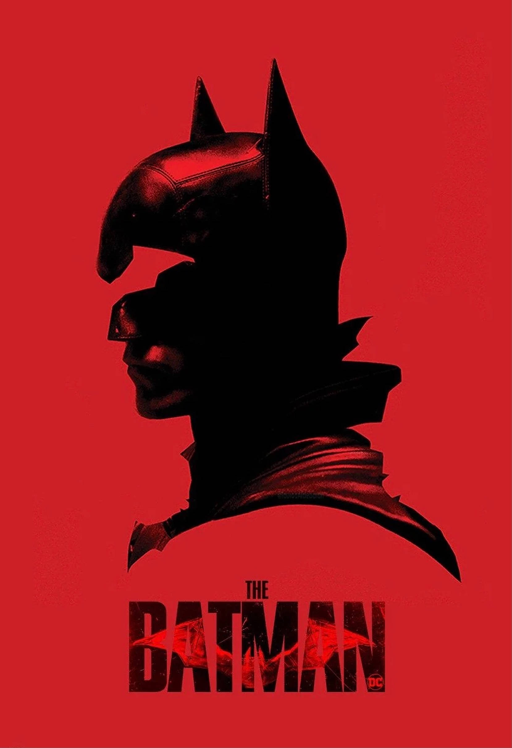 The Batman 2022 桌布 壁紙 — 一個清晰的蝙蝠俠頭部和肩膀剪影，背景為鮮紅色，下方有標題「The Batman」。