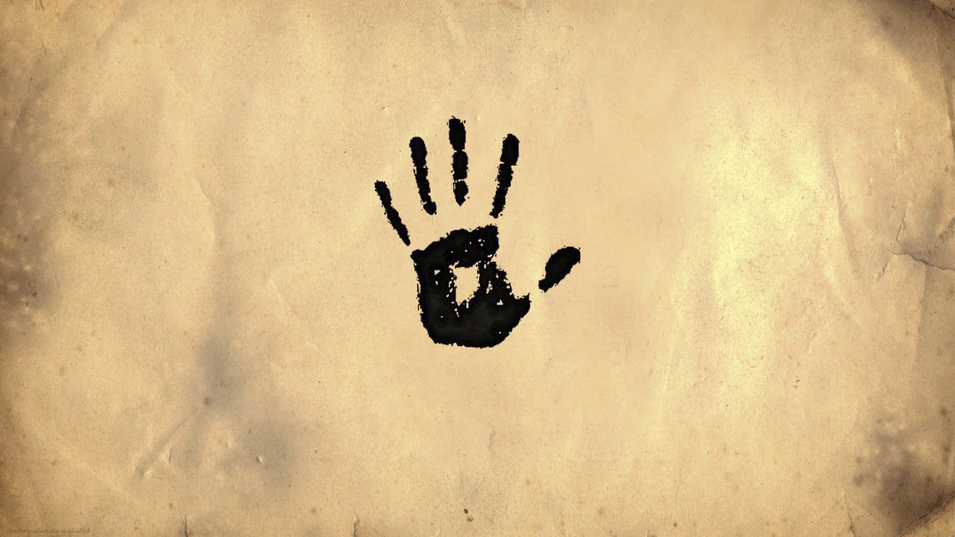 Dark Brotherhood 桌布 壁紙 — 一個清晰的黑色手印沾在舊羊皮紙上，帶有可見的皺紋和污漬。