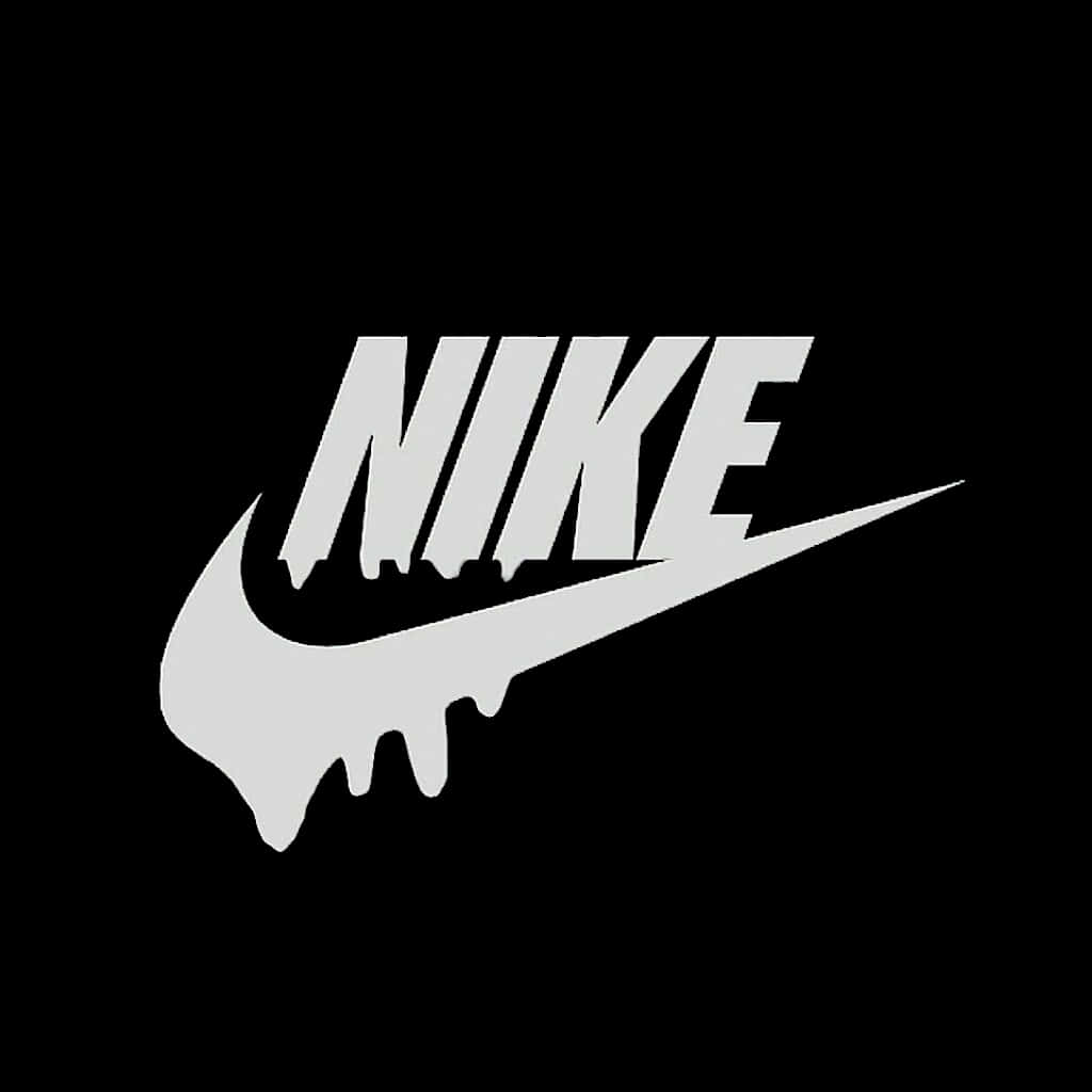 滴落感 桌布 壁紙 — 一個滴落效果的白色Nike標誌，帶有粗體字和勾號，背景為純黑色。