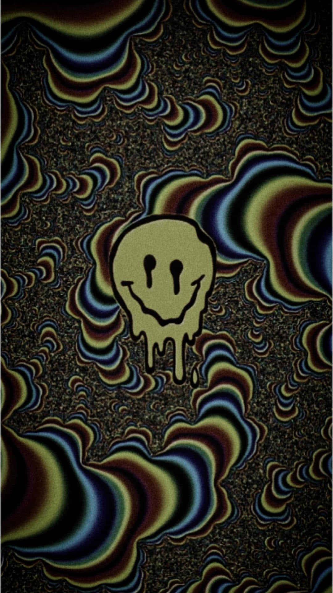 笑臉 桌布 壁紙 — 一個滴落的黃色笑臉在黑暗紋理背景上，漂浮在旋轉的迷幻彩虹波浪中。