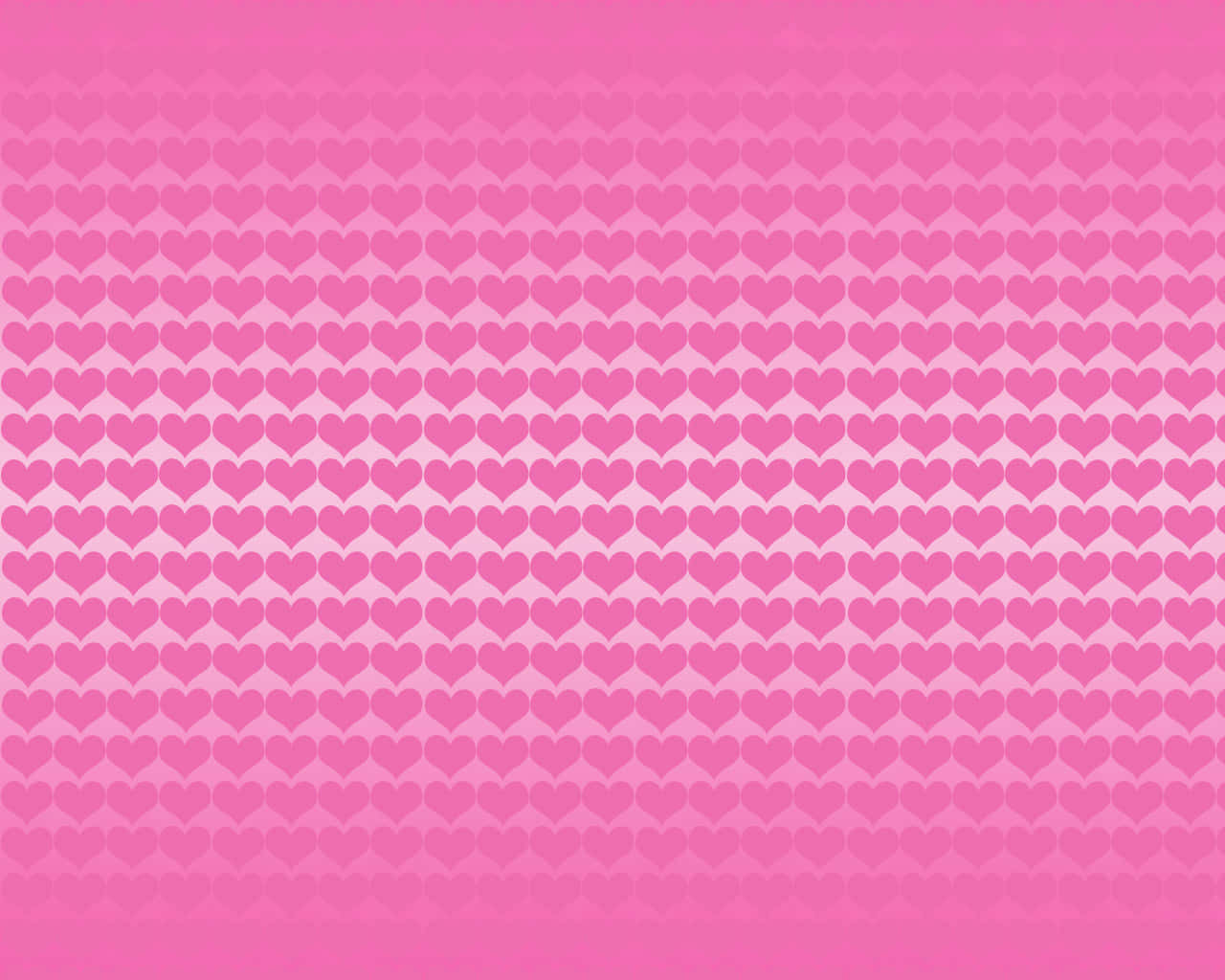 Pink Pattern 桌布 壁紙 — 一個漸變粉紅色背景，充滿重複的心形圖案，從淺粉紅色漸變到深粉紅色。
