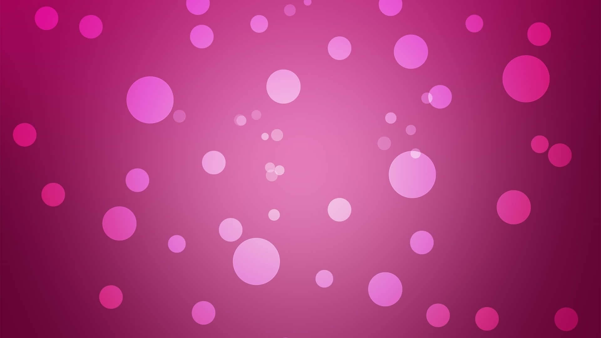 Pink Girly 桌布 壁紙 — 一個漸變粉紅色背景，點綴著散落的發光半透明圓圈，大小各異。