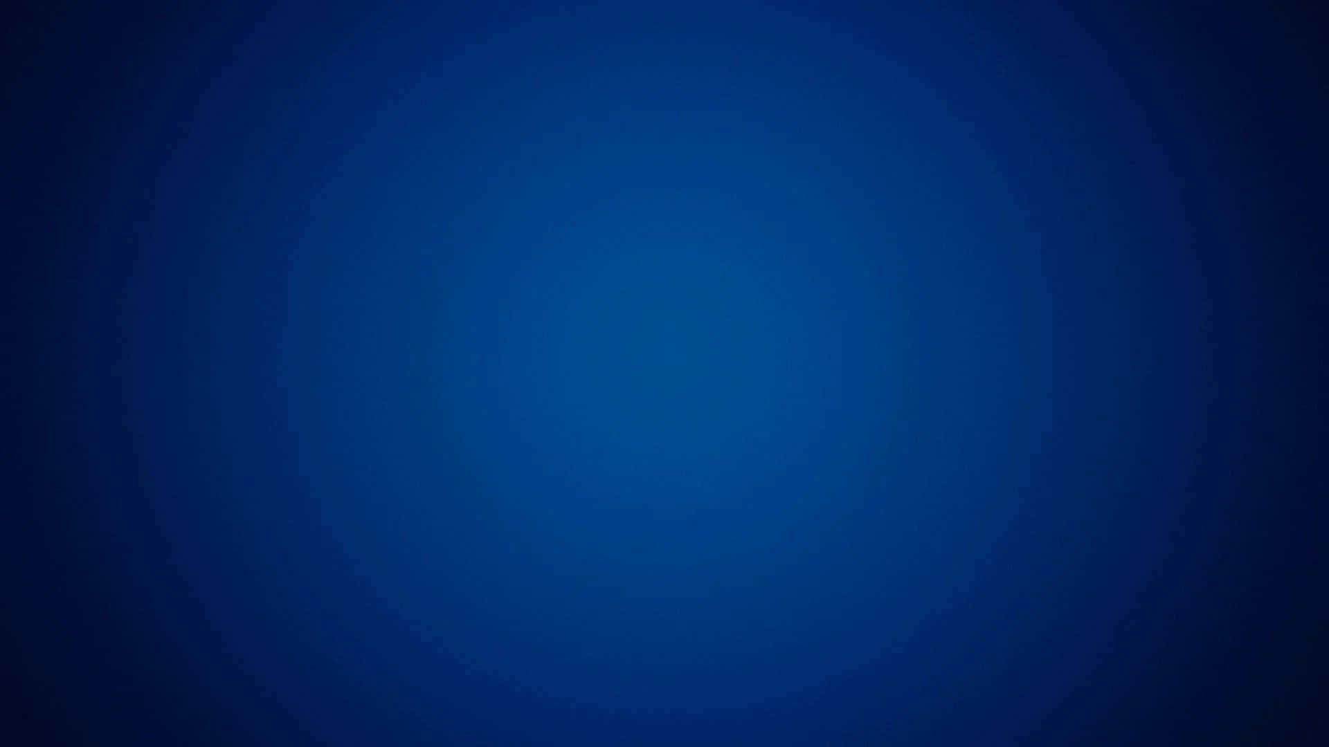 Gradient Blue 桌布 壁紙 — 一個漸變藍色背景，帶有從深藍色漸變到淺藍色的同心圓。