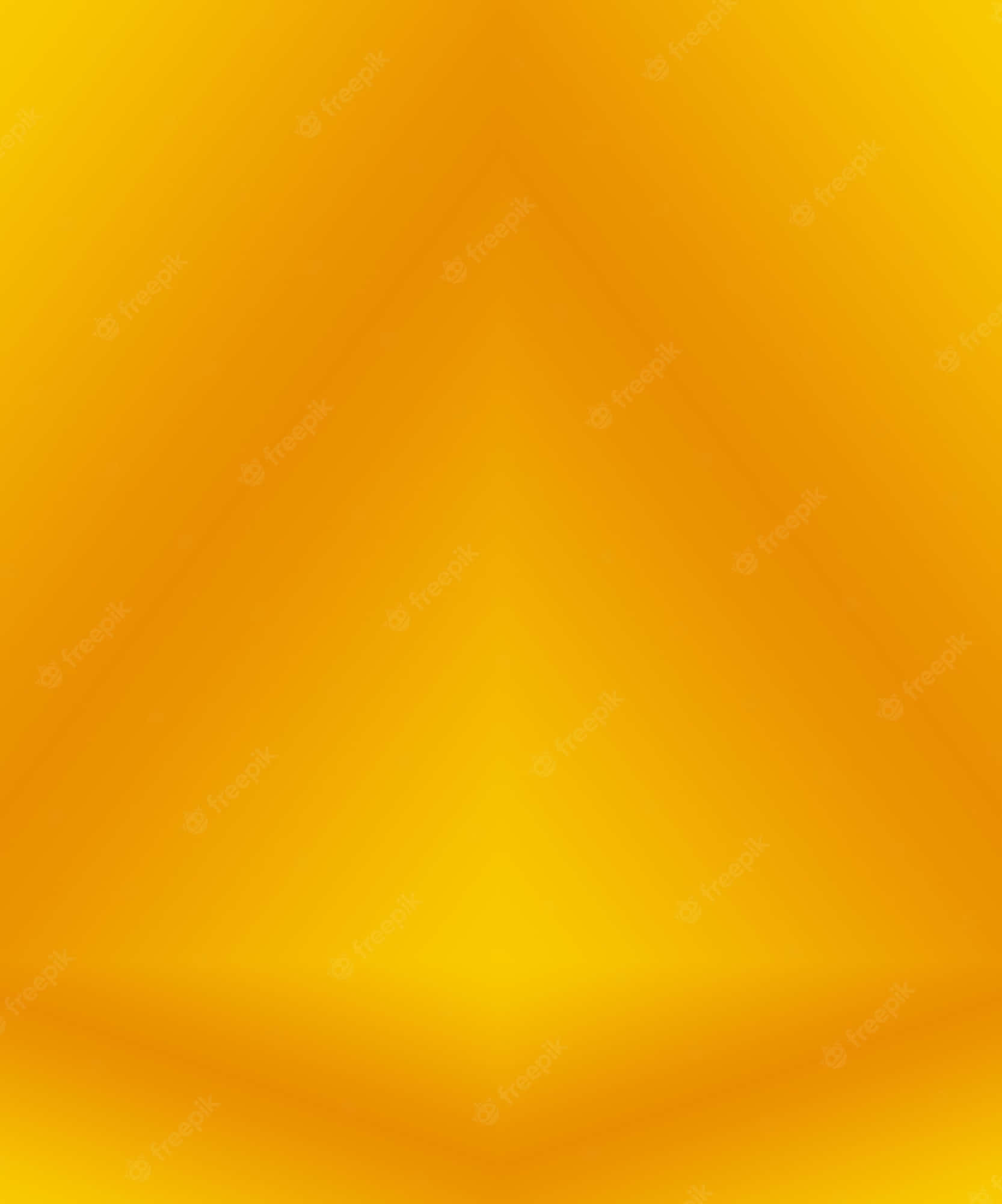 Yellow Grunge 桌布 壁紙 — 一個漸變黃色抽象背景，柔和光線匯聚於中心。