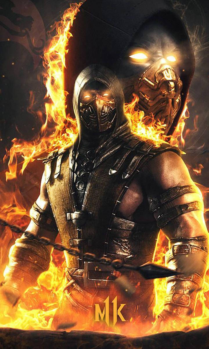 Mk11 桌布 壁紙 — 一個火焰面具戰士威嚇地站立，火焰吞噬他的身形，一個發光骷髏在他身後聳立。
