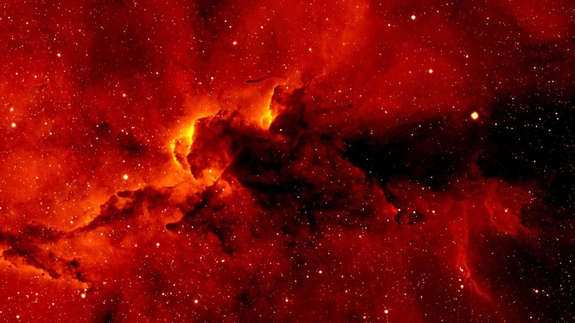 1920x1080 Red 桌布 壁紙 — 一個火紅色的星雲，帶有發光的橙色核心和散落的星星，充滿了宇宙的虛空。