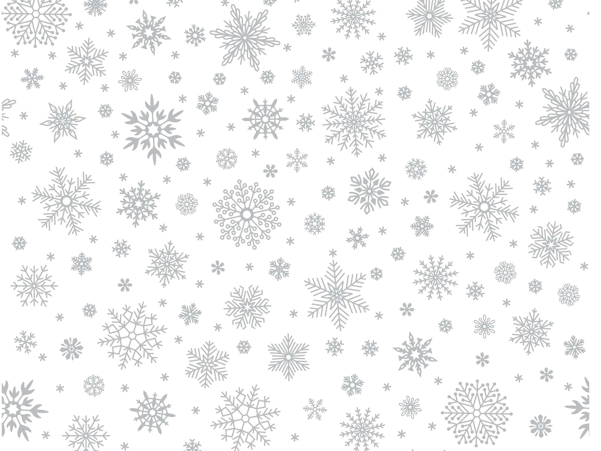 白色背景上的銀色雪花圖案，適合冬季裝飾。 — 雪花 GIF 壁紙