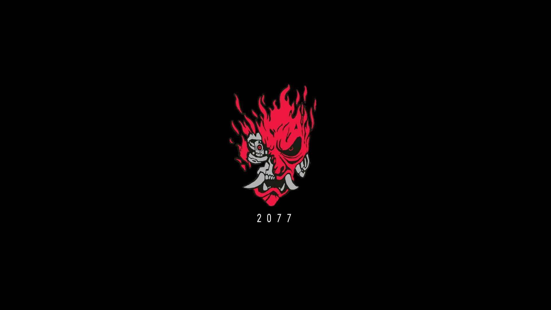 Oni 桌布 壁紙 — 一個熾熱的紅色惡魔面孔，帶有鋒利的牙齒和發光的眼睛，居中在黑色背景上，下方有年份2077。