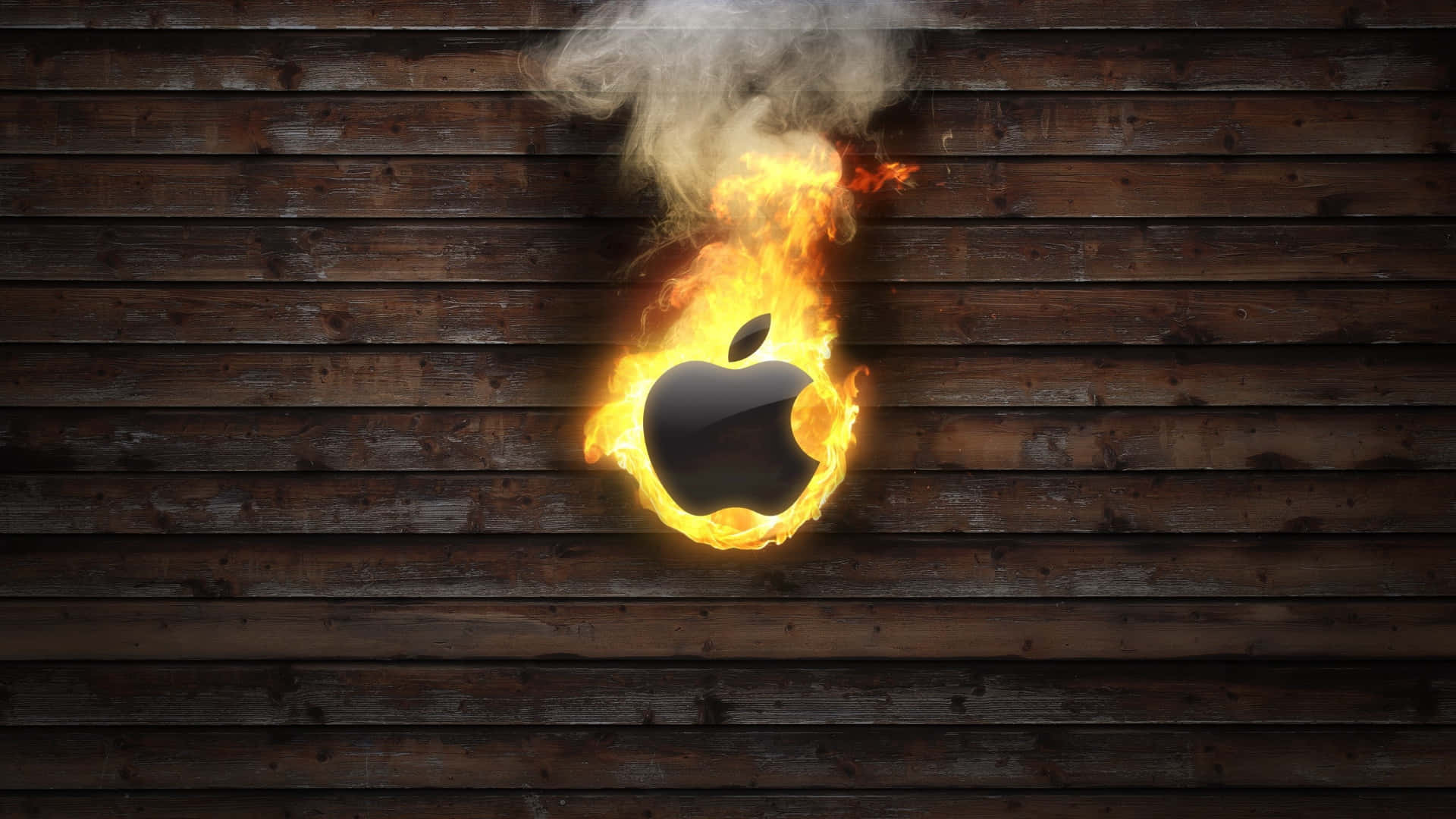 火焰動畫 桌布 壁紙 — 一個燃燒中的Apple標誌在深色木板上鮮明地燃燒，煙霧升騰。