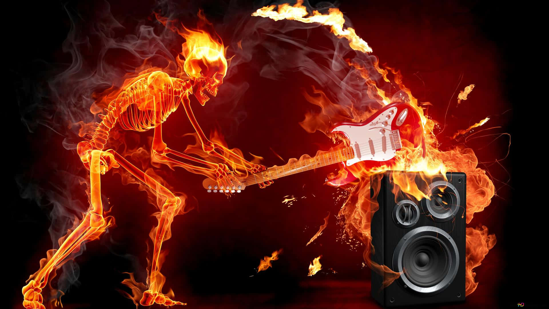 rock n roll 桌布 壁紙 — 一個燃燒的骷髏在紅色和橙色的烈焰中，對著咆哮的揚聲器彈奏著火焰電吉他。