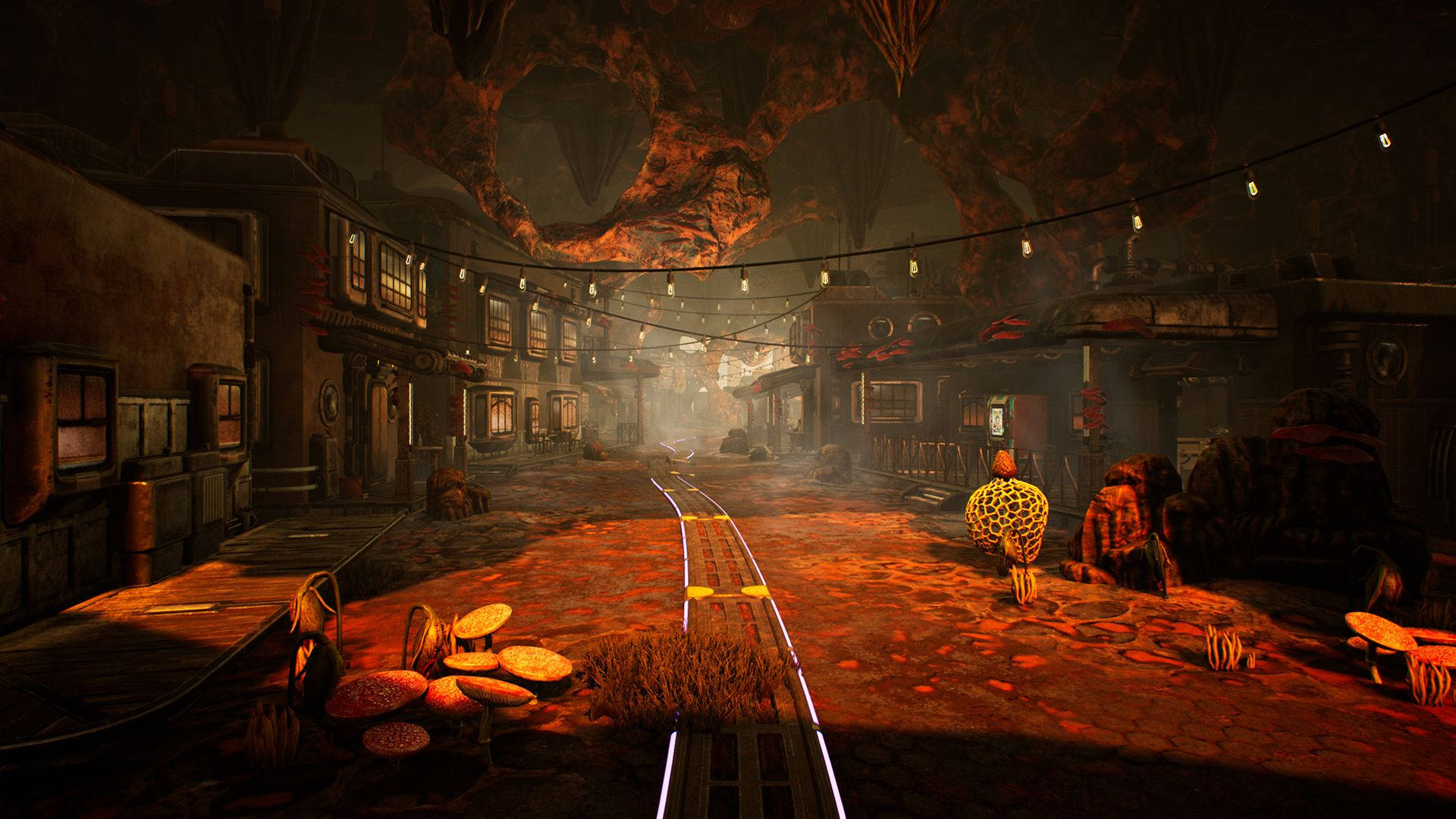 The Outer Worlds 桌布 壁紙 — 一個燈光昏暗的外星小鎮，在洞穴般的天花板下，有發光的橙色軌道和懸掛的燈光。