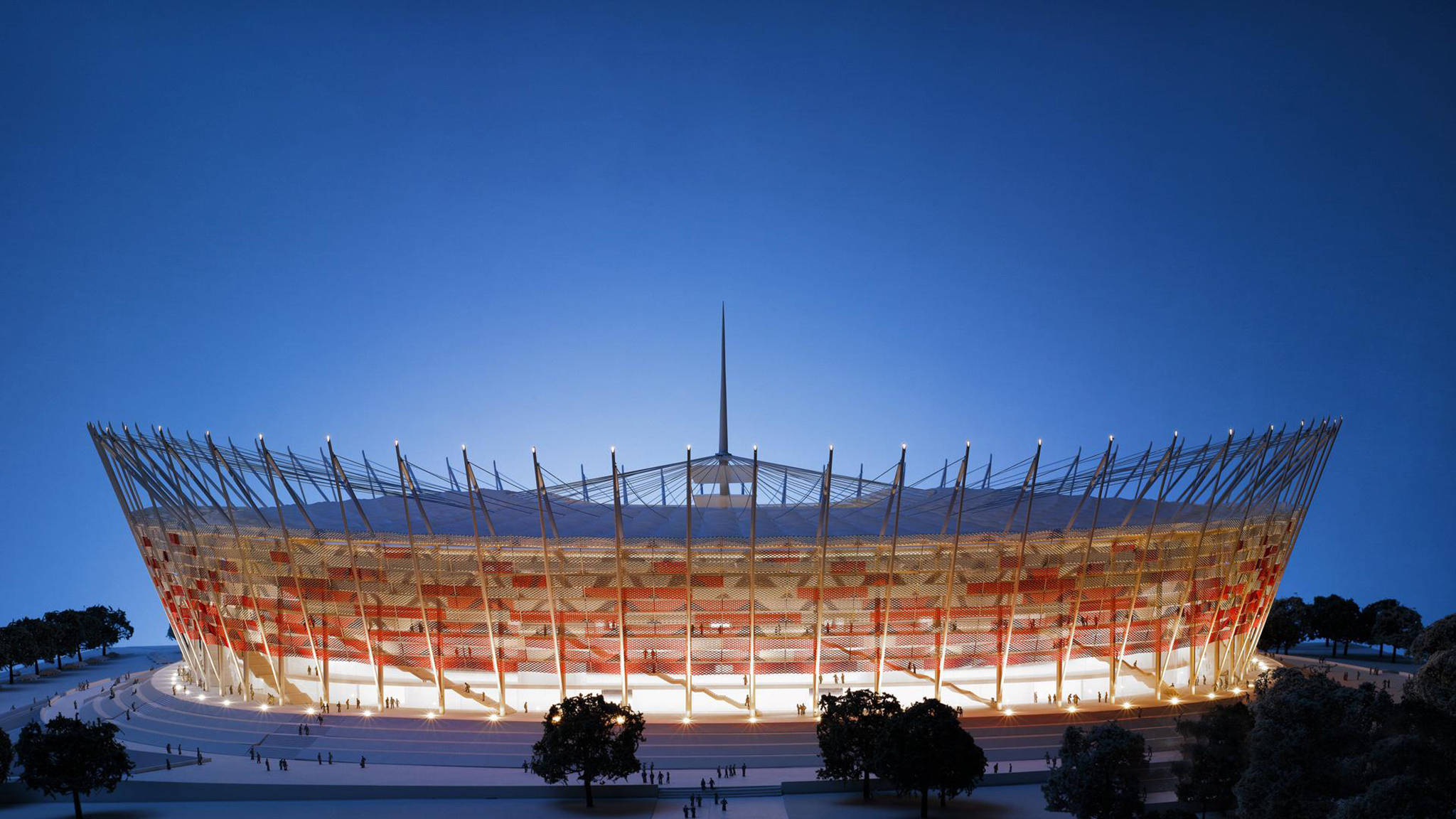 Stadium 桌布 壁紙 — 一個現代化的照明體育場，擁有引人注目的紅白格子屋頂，在深藍色的暮色天空中閃耀。