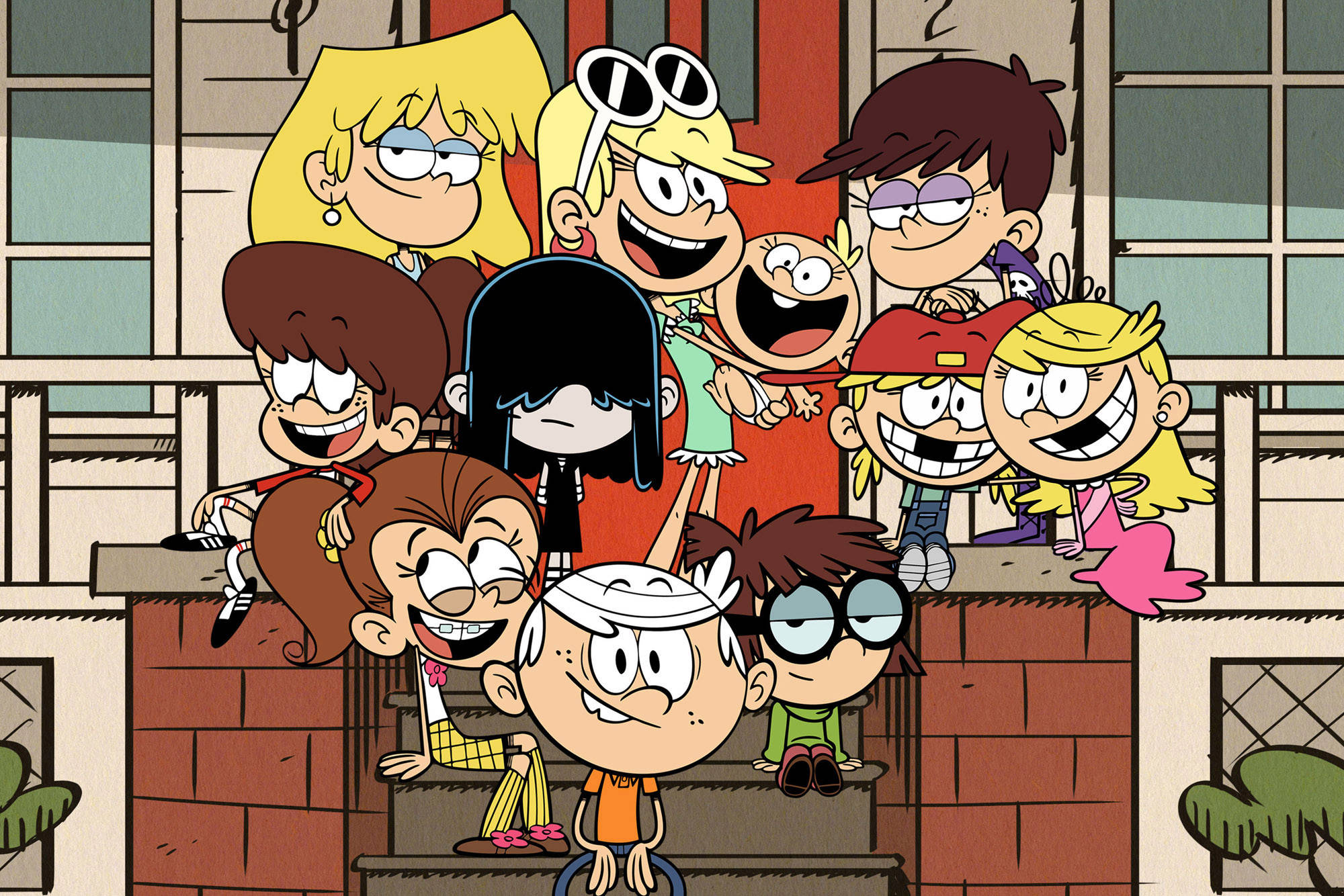 Cartoon Network Characters 桌布 壁紙 — 一個由九個孩子組成的生動卡通家庭，帶著誇張的表情和色彩繽紛的服裝，在磚砌門廊上愉快地擺姿勢。