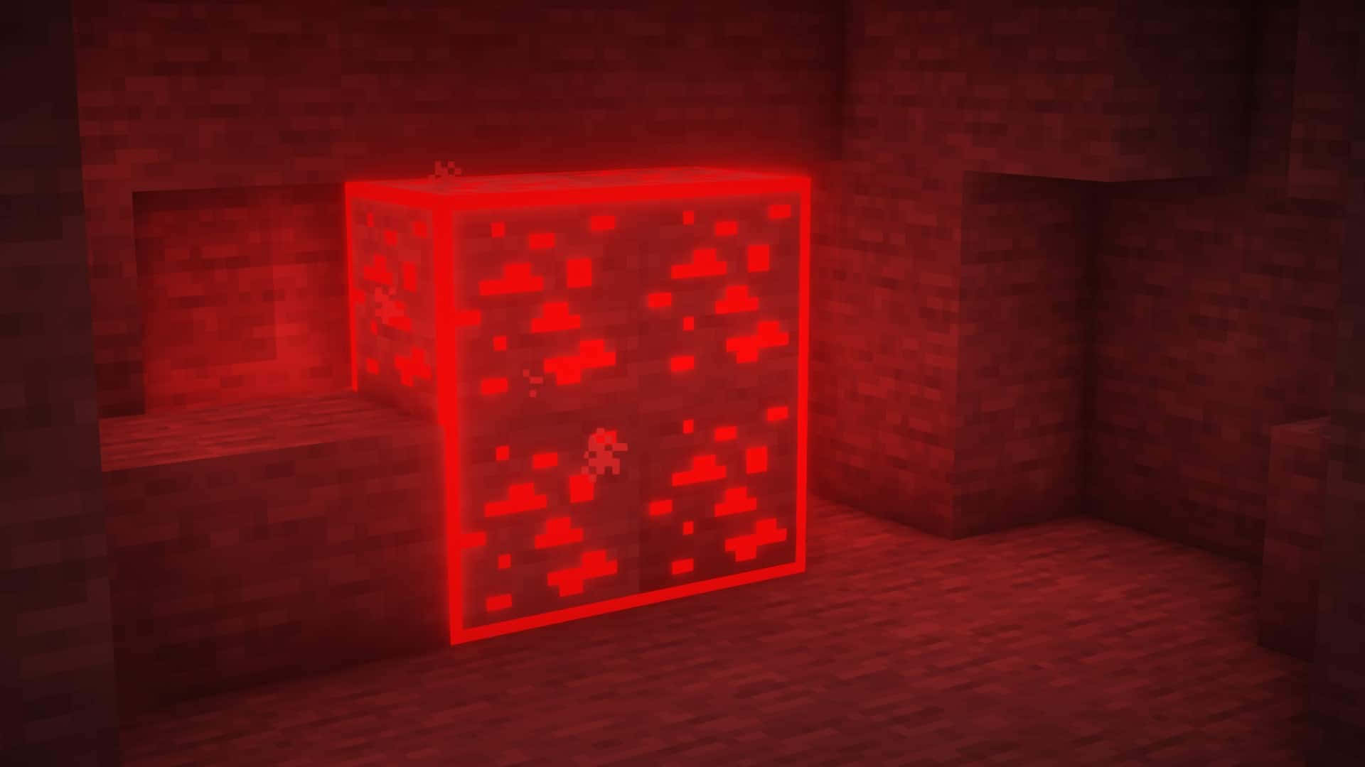 Minecraft Redstone 桌布 壁紙 — 一個由像素方塊製成的發光紅色地獄傳送門，矗立在昏暗的磚牆房間中。