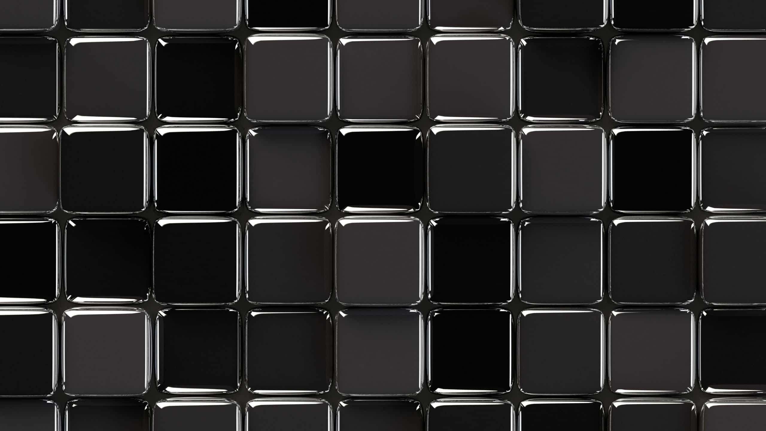 Glossy Black 桌布 壁紙 — 一個由光澤黑色方形瓷磚組成的網格，帶有金屬銀色邊框，在無縫的數字圖案中反射光線。