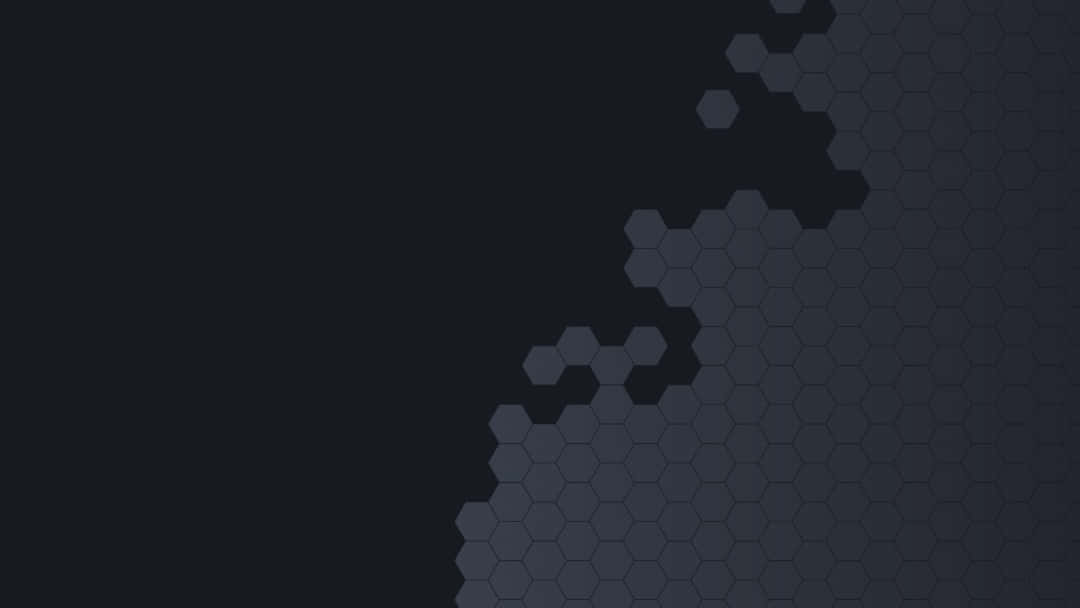 Minimalist HD Geometric Desktop 桌布 壁紙 — 一個由六邊形組成的深色抽象圖案，在帶有微妙漸變的黑色背景上沿對角線淡出。