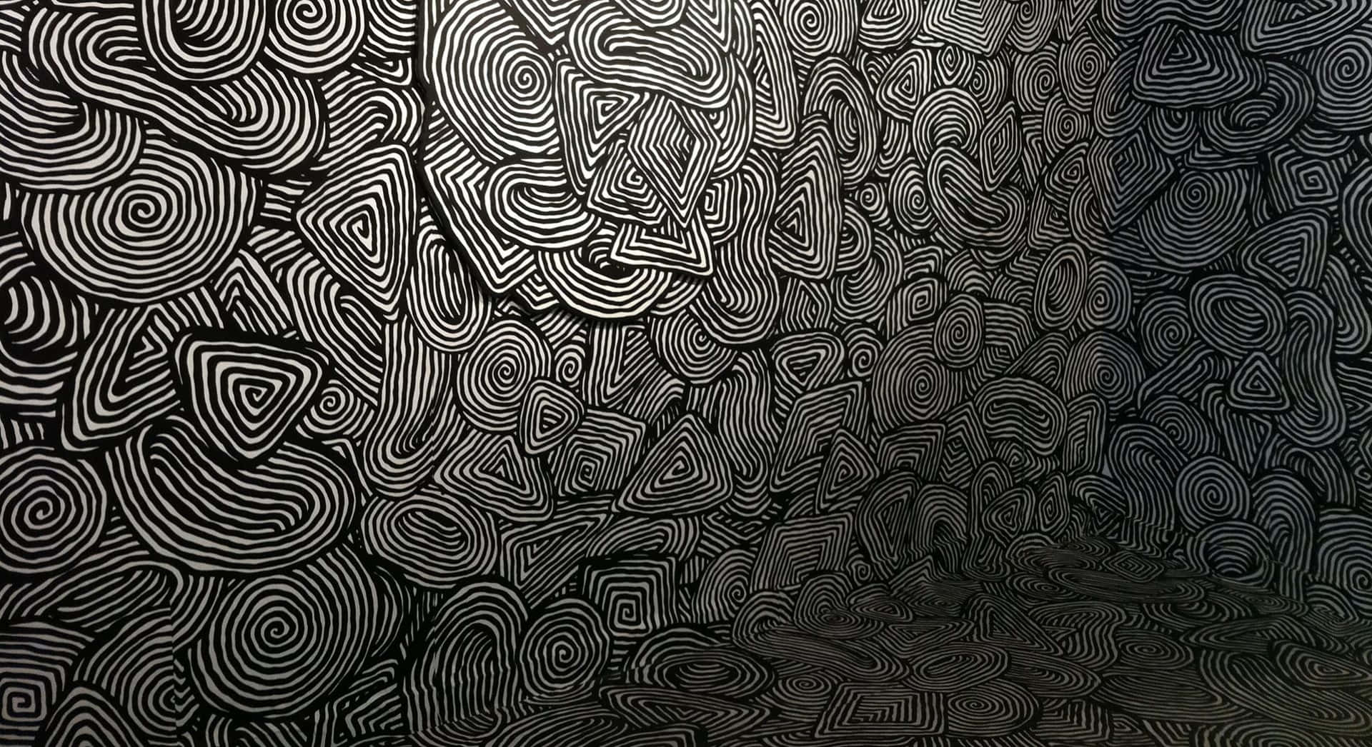 Pattern Desktop 桌布 壁紙 — 一個由旋轉線條和幾何形狀組成的迷人黑白抽象圖案，營造出催眠般的視覺隧道效果。