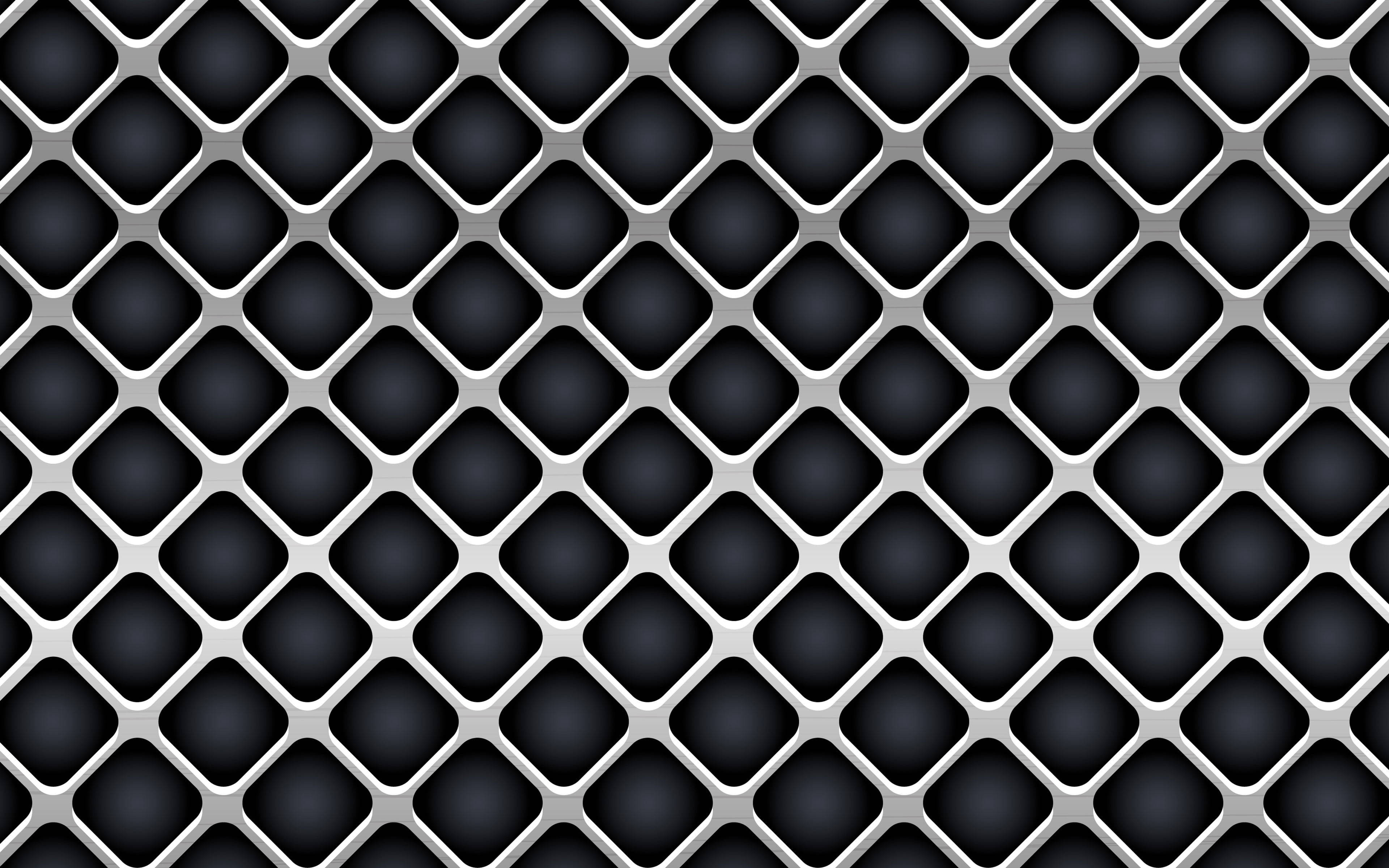 black and white aesthetic grid 桌布 壁紙 — 一個由相互鎖扣的銀色菱形形狀和深色中心組成的時尚幾何圖案，營造出現代金屬質感。