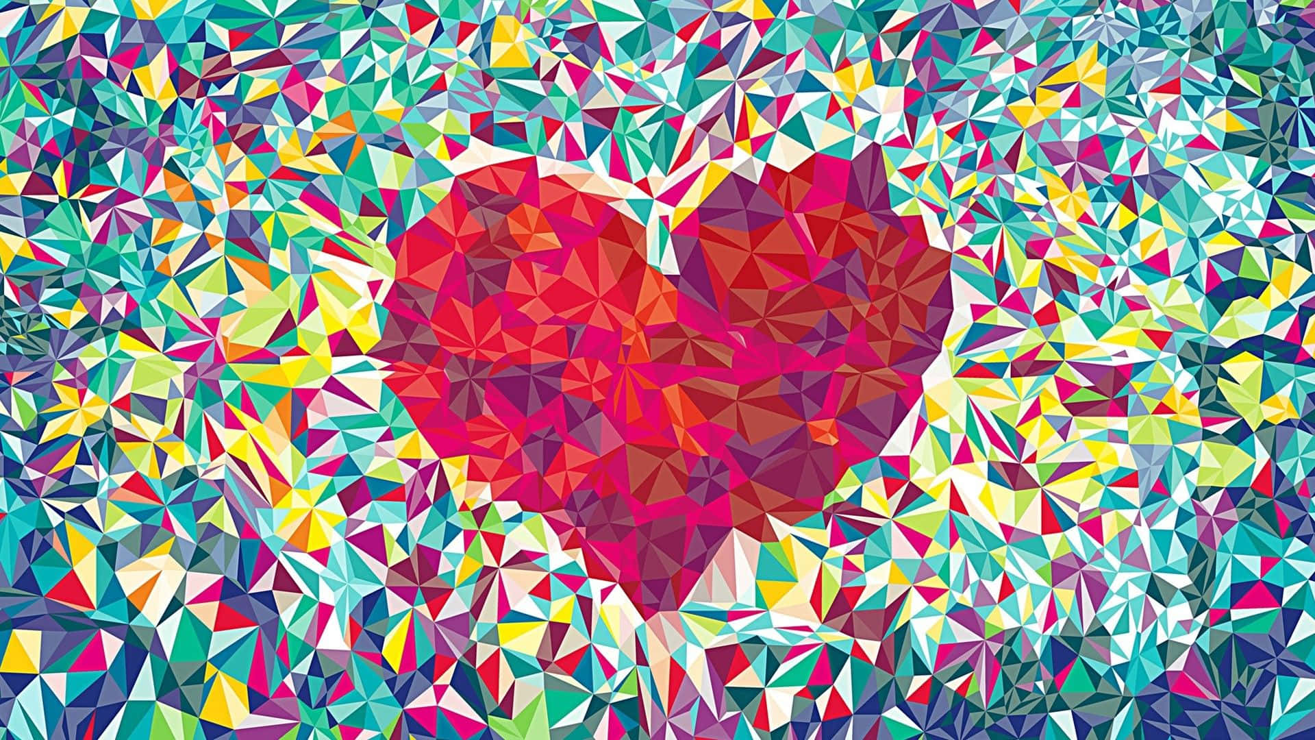 愛心 桌布 壁紙 — 一個由紅色三角形組成的充滿活力的低多邊形心臟，在萬花筒般的多色幾何碎片馬賽克中閃耀。
