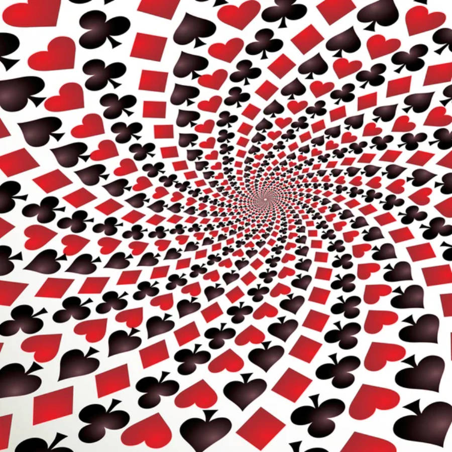 Playing Cards 桌布 壁紙 — 一個由紅色和黑色撲克牌花色組成的催眠螺旋，在白色背景上逐漸縮小至消失點。