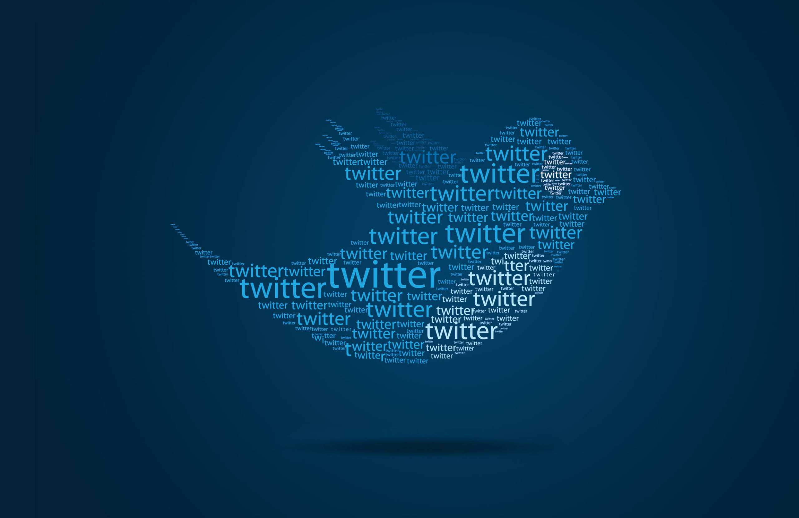 Twitter 桌布 壁紙 — 一個由重複不同大小的「twitter」文字組成的Twitter鳥標誌，背景為深藍色漸變。