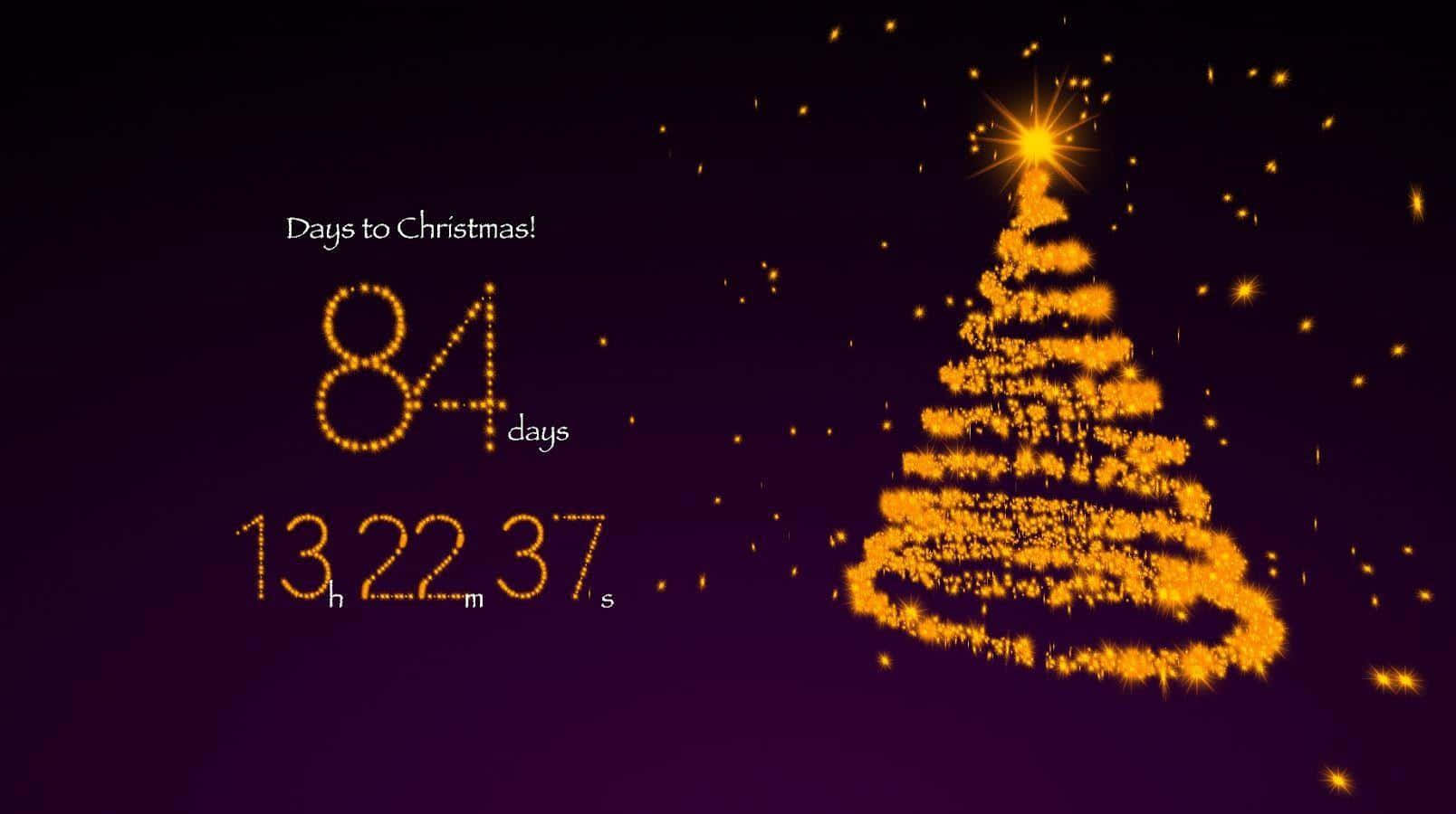 Christmas Countdown 桌布 壁紙 — 一個由閃爍粒子組成的發光金色聖誕樹，旁邊有一個倒數計時器，背景是深紫色。