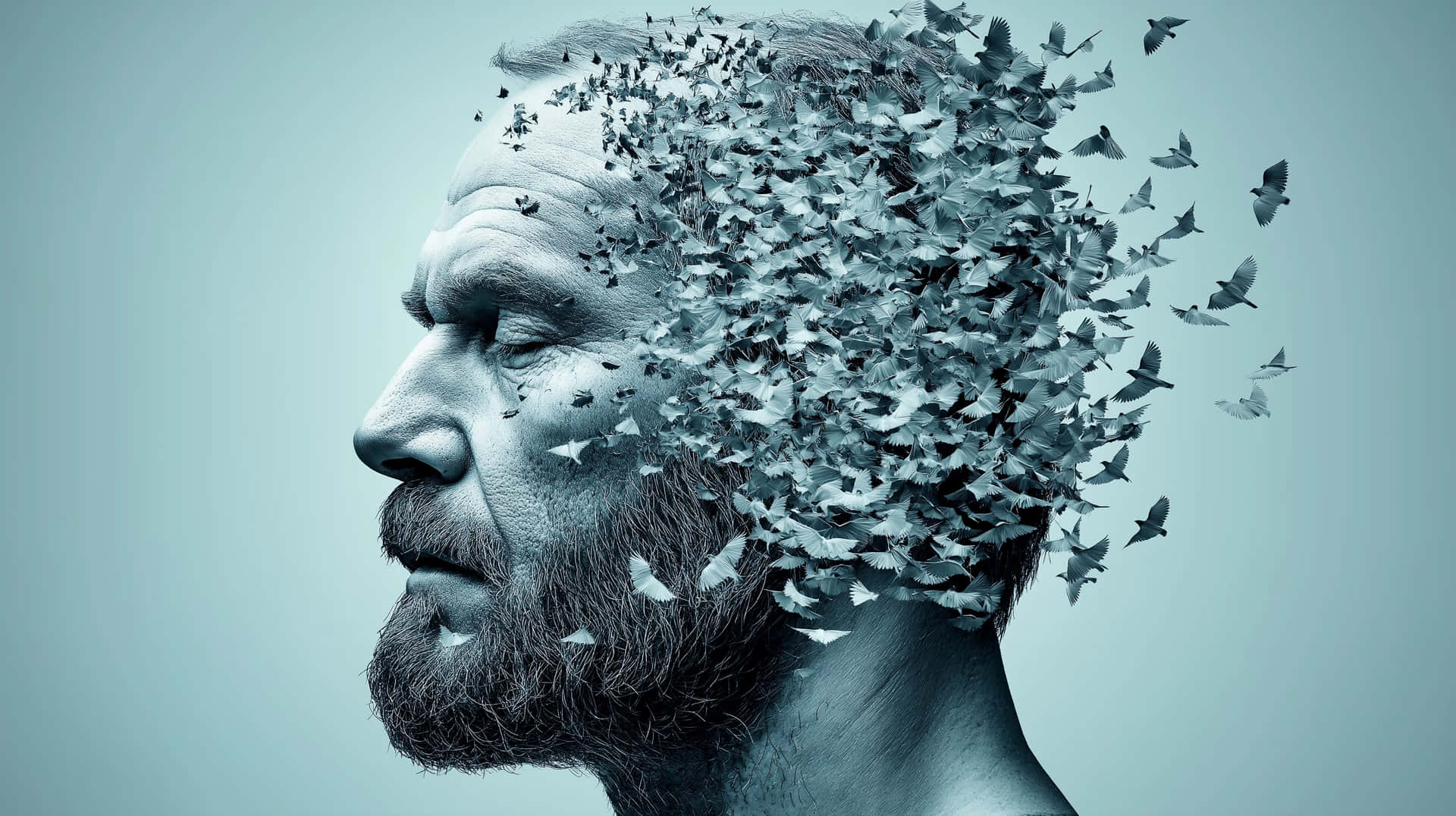 Man's Head Disintegrating into Birds, Concept of Memory Loss 壁紙 — 一個男人的側面，鳥兒從他的頭部飛出，背景是淡藍色。