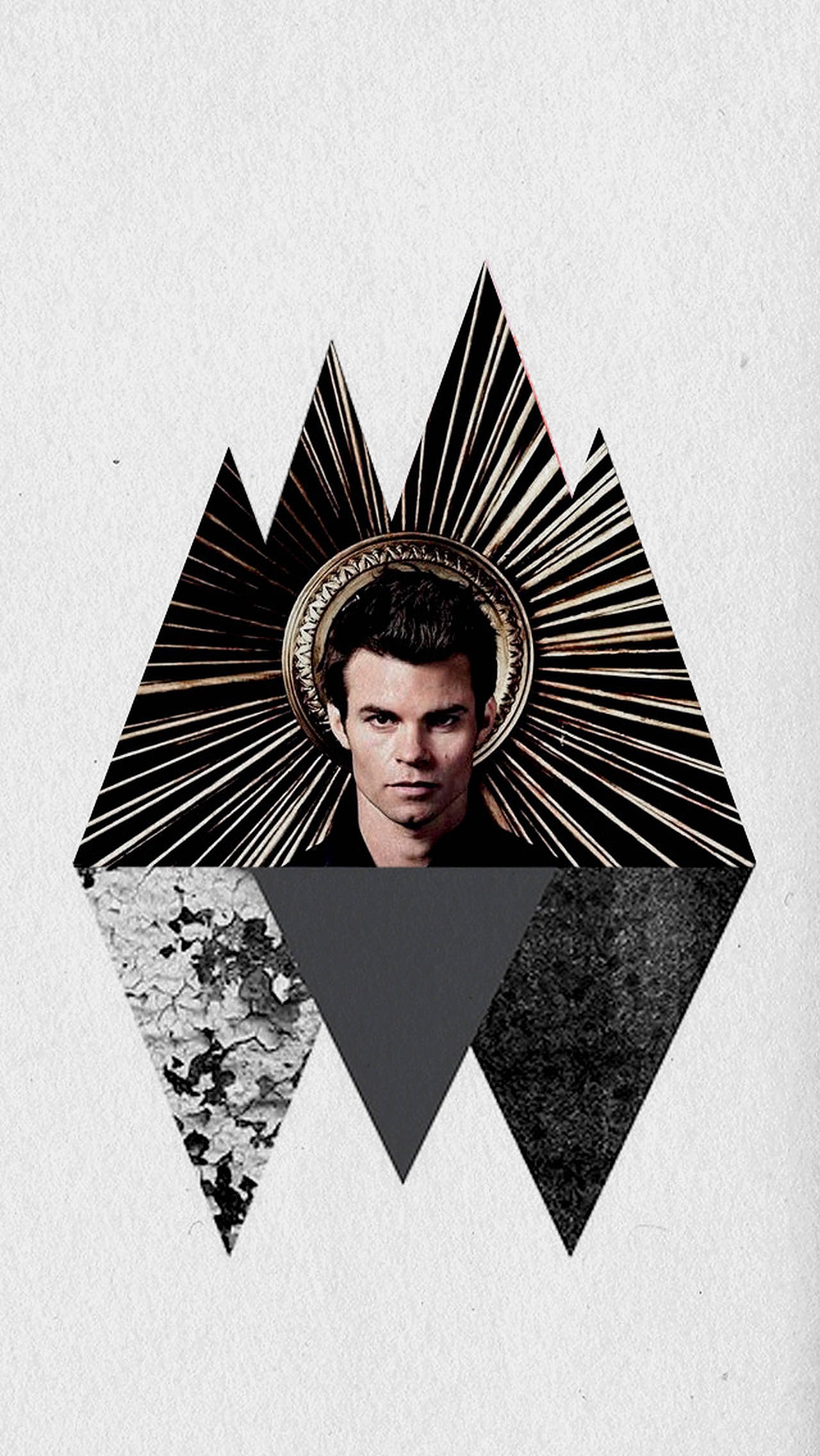 Daniel Gillies 桌布 壁紙 — 一個男人的肖像，以幾何金色和黑色三角形光環框住，背景為有紋理的白色。