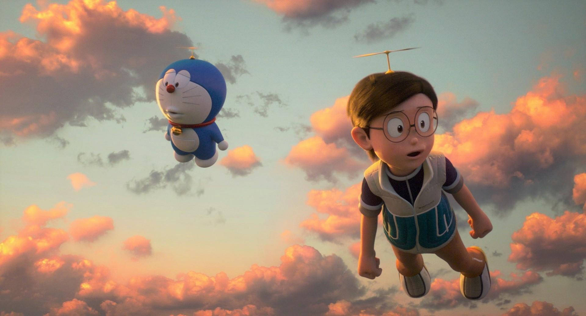Doraemon And Nobita 桌布 壁紙 — 一個男孩和一個藍色機器人頭頂著小螺旋槳，飛過夕陽雲層。