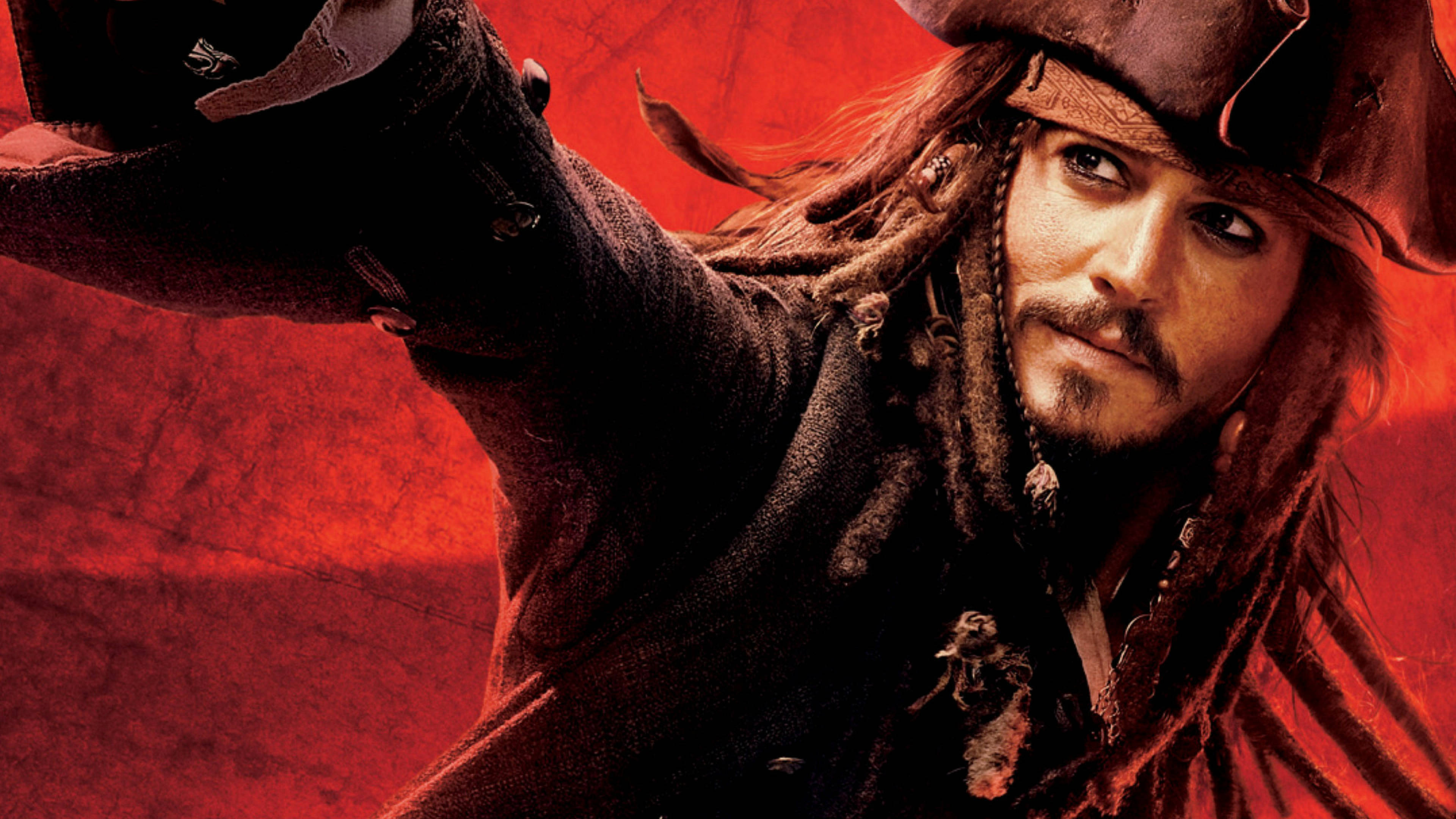 Pirates Of The Caribbean 桌布 壁紙 — 一個留著辮子、戴三角帽的海盜，在火紅紋理背景前向前指。