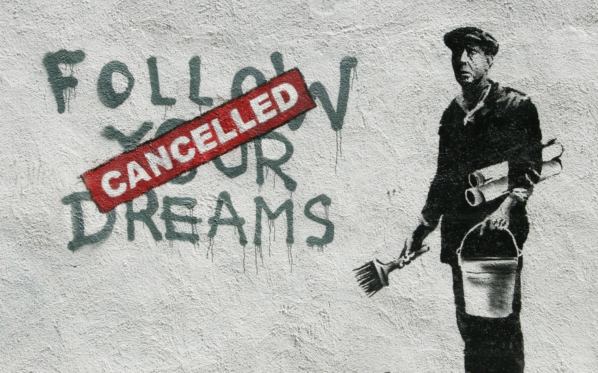 Banksy 桌布 壁紙 — 一個畫家拿著畫筆和水桶的模板塗鴉，旁邊的句子「FOLLOW YOUR DREAMS」被一個紅色的「CANCELLED」印章劃掉。