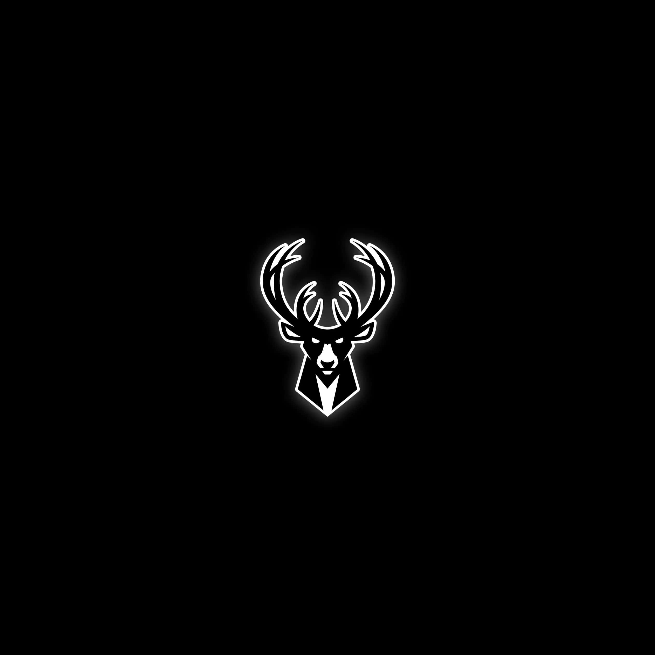Bucks 桌布 壁紙 — 一個發光白色霓虹燈鹿頭輪廓，鹿角置中，背景為純黑色。