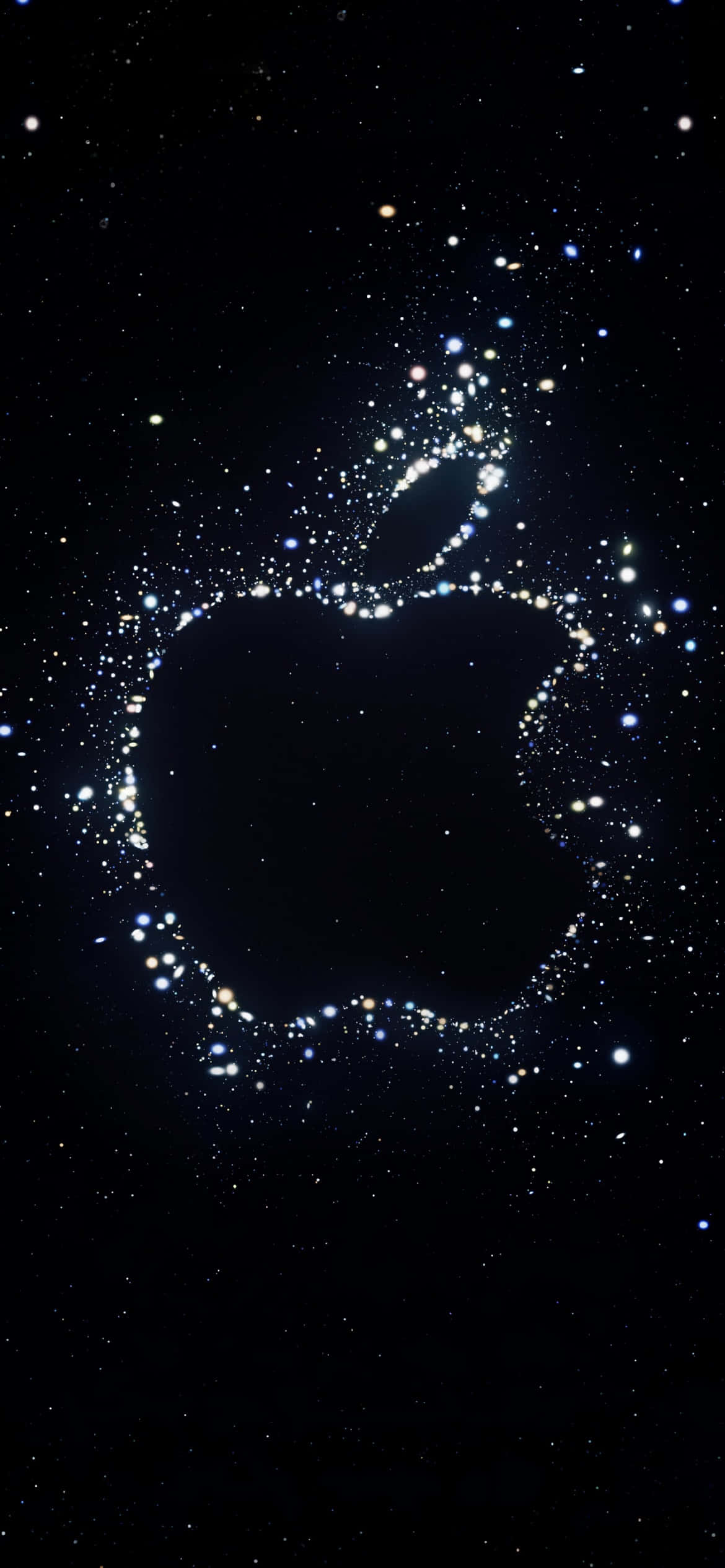 蘋果 桌布 壁紙 — 一個發光的Apple標誌，由閃爍的星星在深邃的黑色宇宙背景上形成。