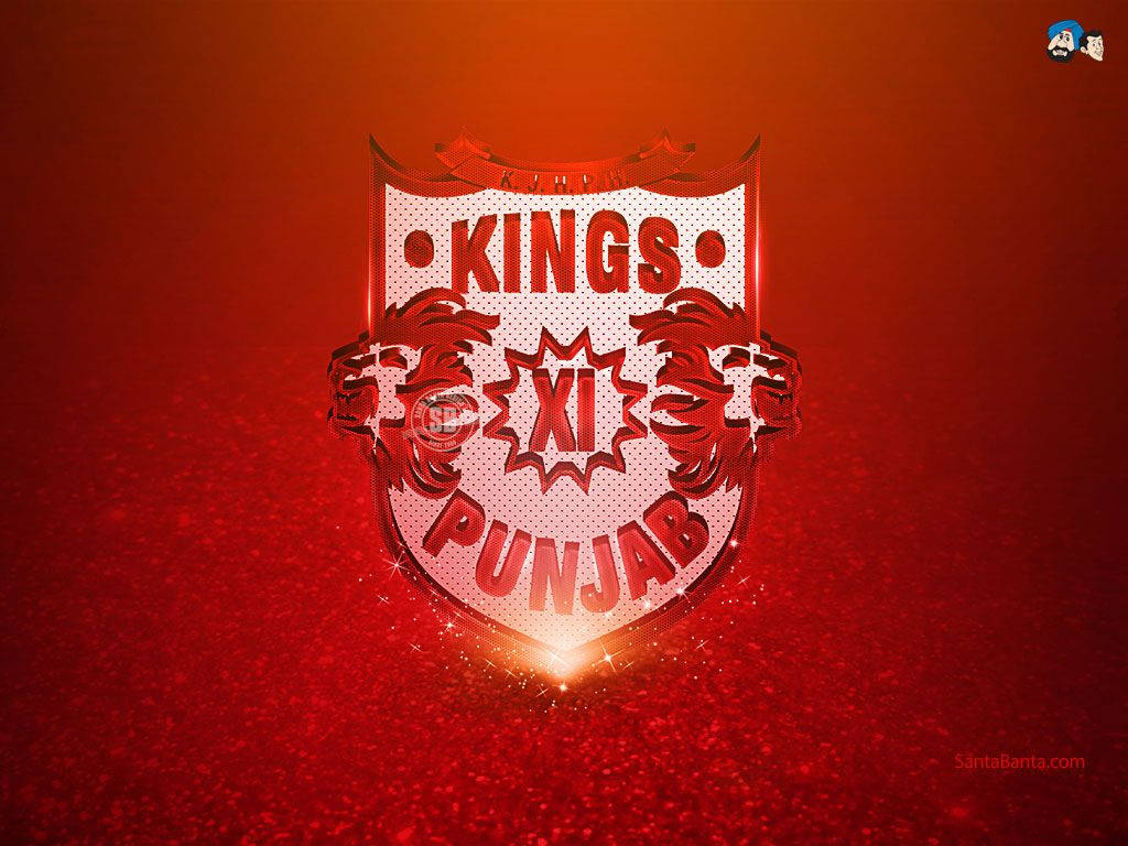 桌布 壁紙 — 一個發光的Kings XI Punjab體育標誌盾牌，帶有獅子頭和閃光，背景為漸變紅色。
