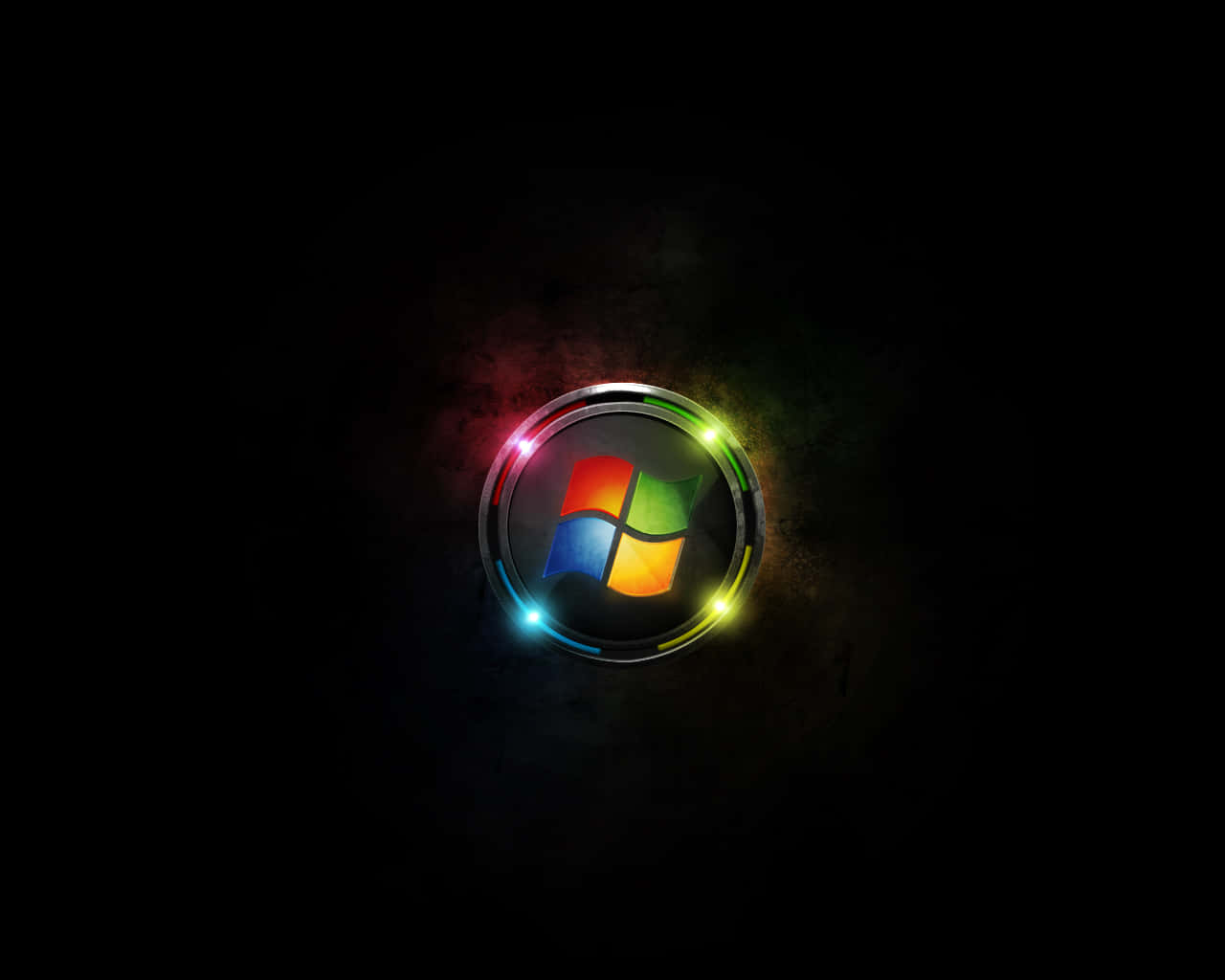 Black Windows 桌布 壁紙 — 一個發光的Windows標誌，帶有彩虹燈光，在深色紋理背景上脈動。