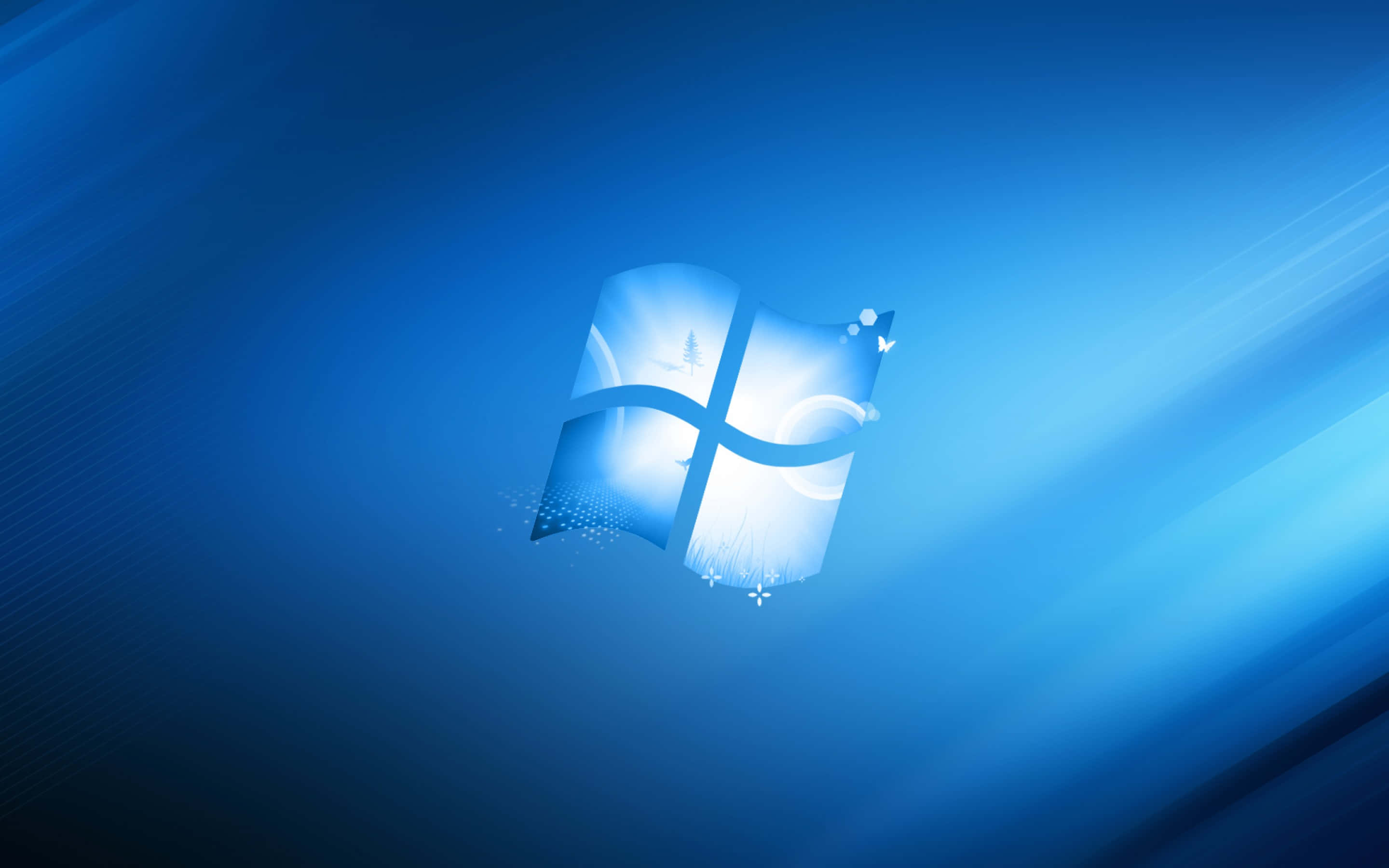 Windows 10 桌布 壁紙 — 一個發光的Windows標誌漂浮在帶有光線條紋的燦爛藍色漸變背景上。