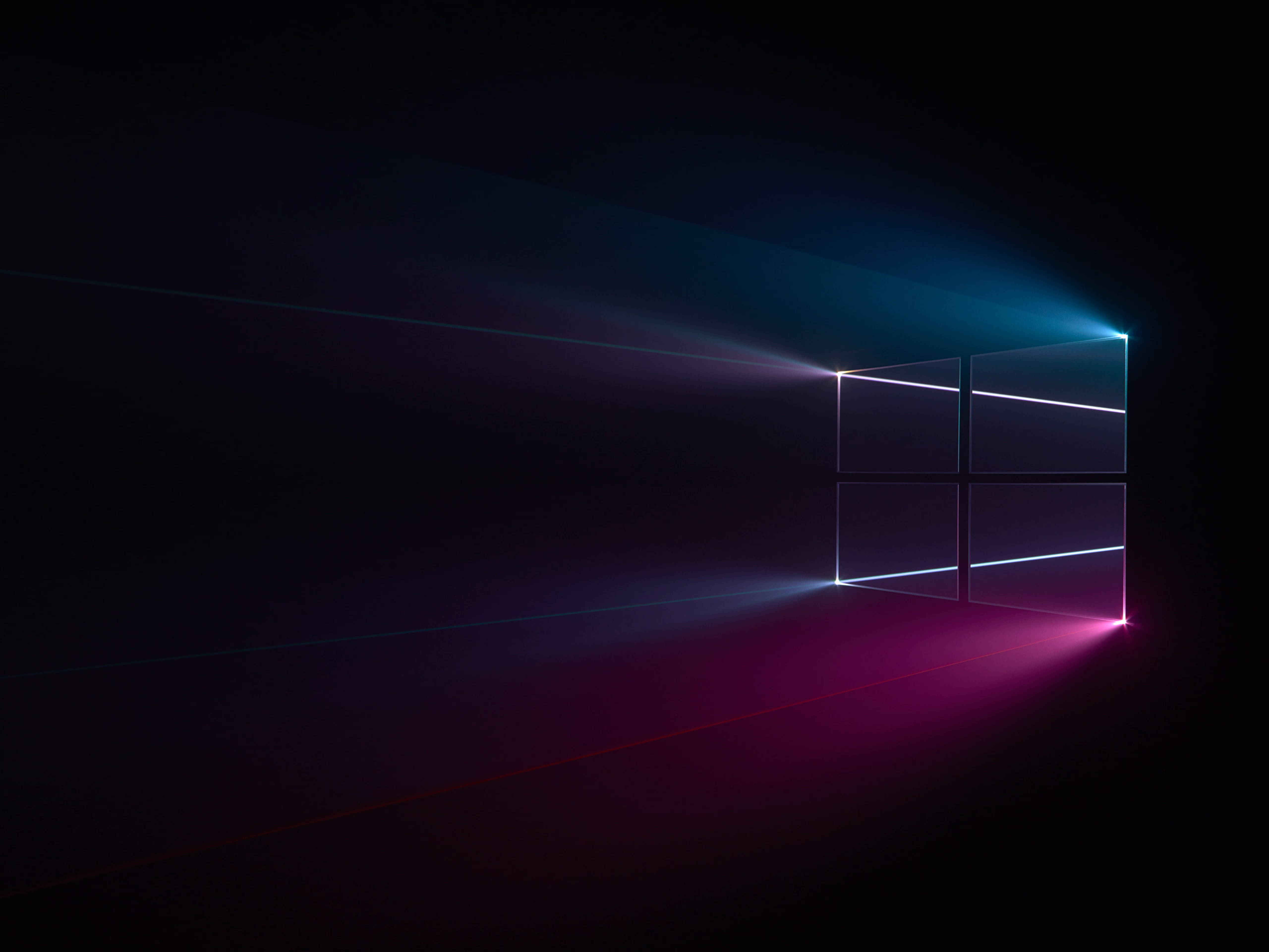 Windows 10 桌布 壁紙 — 一個發光的Windows標誌窗戶在黑暗虛空中發出鮮豔的藍色和洋紅色光束。